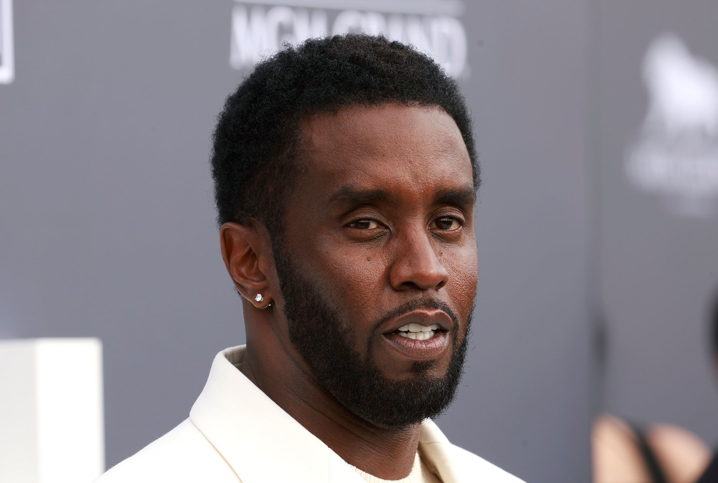 Two properties belonging to rapper Sean "Diddy" Combs' in Los Angeles and Miami were searched Monday by federal Homeland Security Investigations agents and other law enforcement as part of an ongoing sex trafficking investigation, two law enforcement officials told The Associated Press.