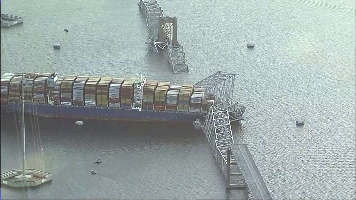 Parts of the Francis Scott Key Bridge remain after a container ship collided with a support Tuesday in Baltimore.