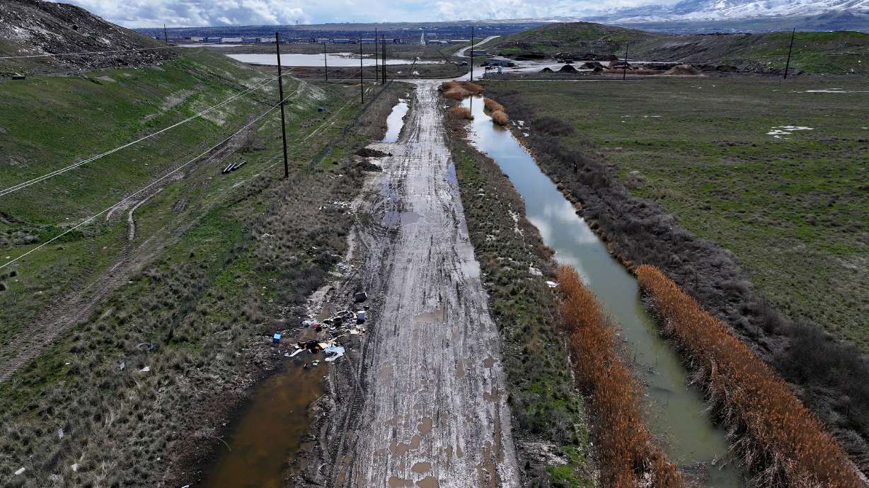 Junk is piled on the side of the road along 7200 West on Monday, March 25, 2024. Salt Lake City closed the section temporarily two years ago, but it's now looking to extend it indefinitely, alongside another road on the west side.