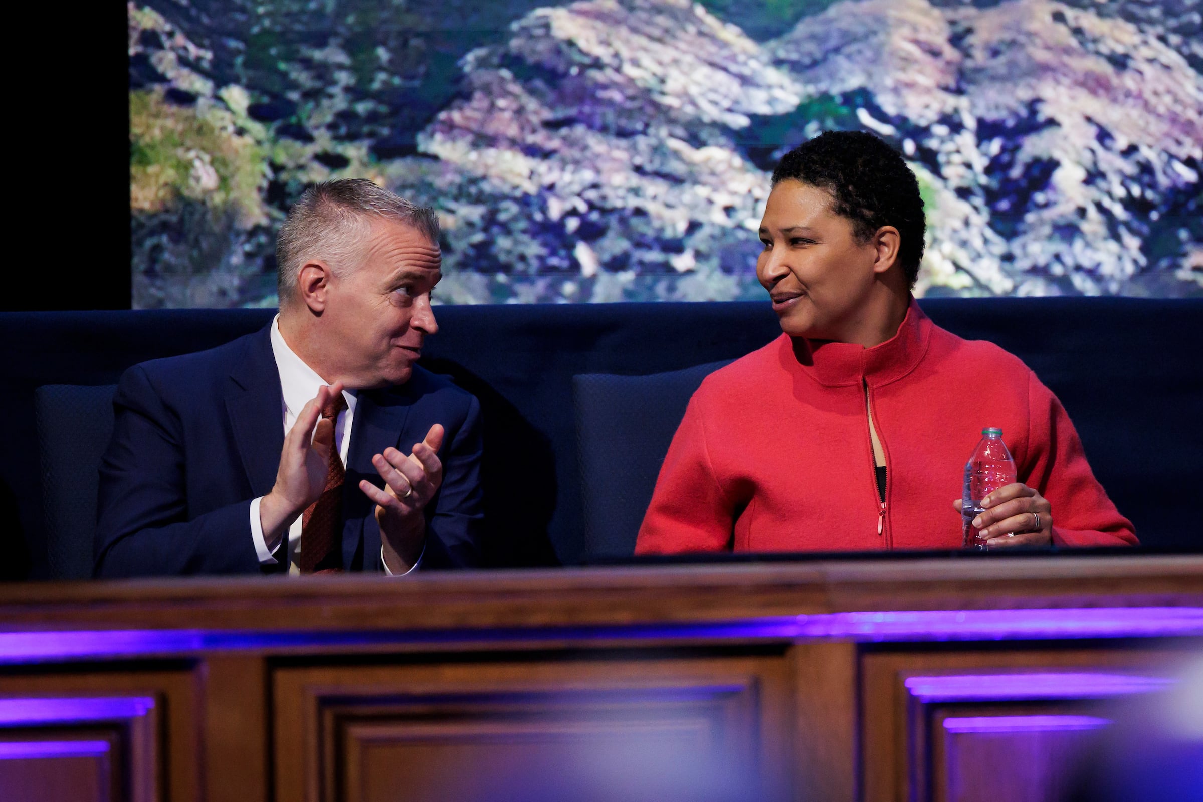 BYU President C. Shane Reese, left, speaks with Harvard professor Danielle Allen at the BYU devotional Tuesday, March 26, 2024.