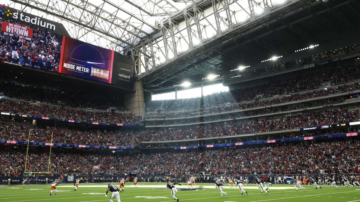 FILE - The opening kickoff in a general stadium view during an NFL wild-card playoff football game, Jan. 13, 2024, in Houston. The NFL competition committee is proposing a rule to penalize so-called “hip-drop” tackles and a radical change to kickoffs to add more returns without compromising safety.