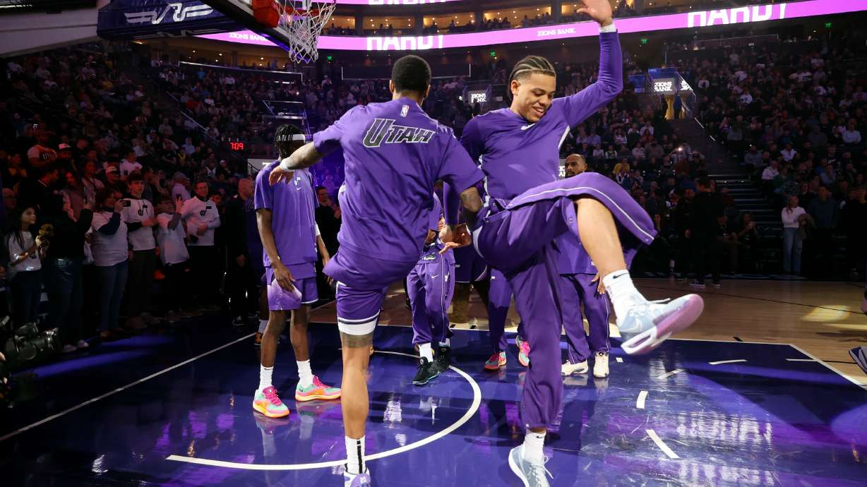 Utah Jazz guard Keyonte George (3) is welcomed onto the court before the Utah Jazz play the Dallas Mavericks in an NBA game at the Delta Center in Salt Lake City on Monday, March 25, 2024.