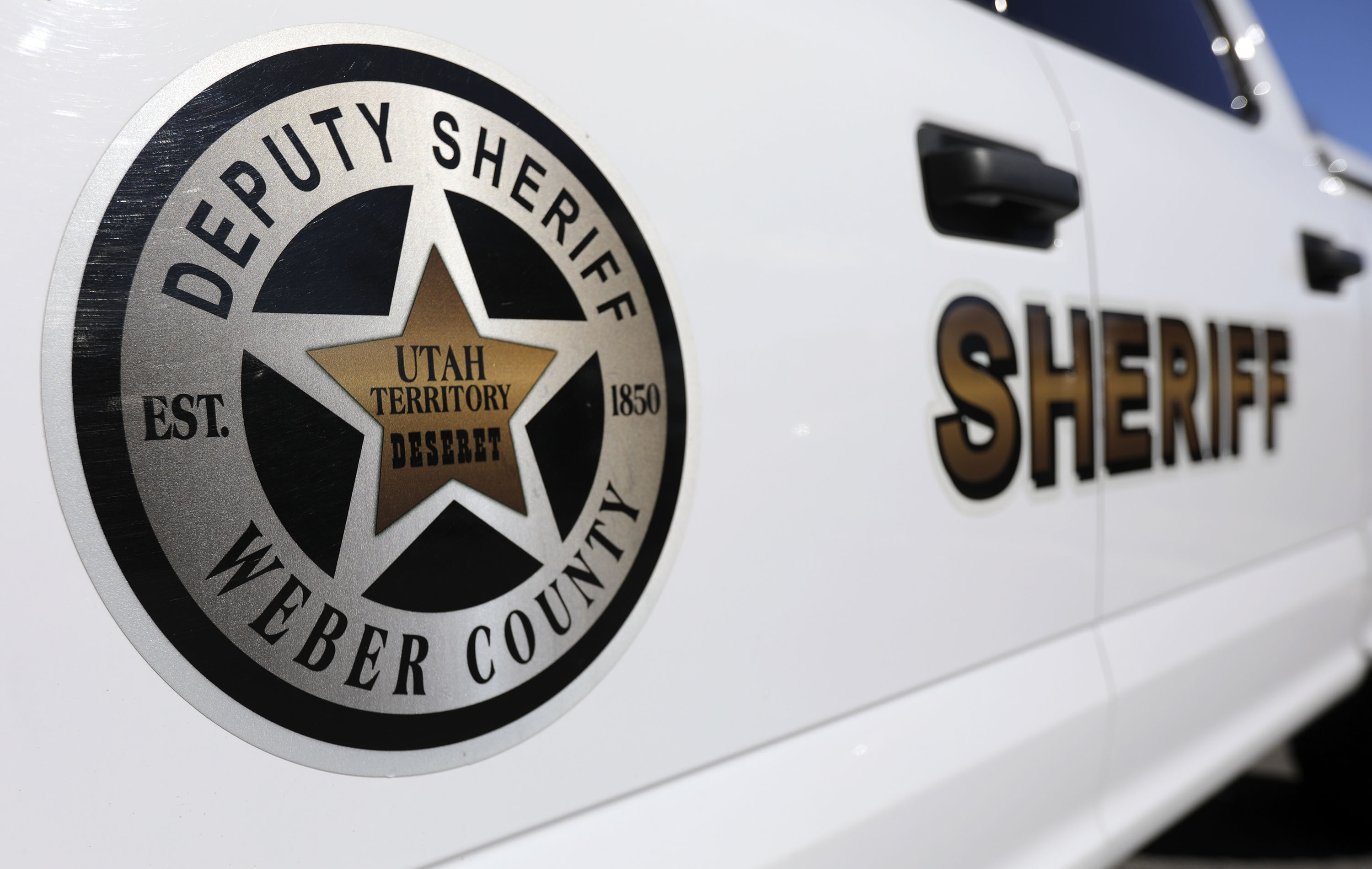 Ogden Canyon was shut down Tuesday afternoon after a van lost control on the snowy roads and collided with some road barriers, damaging the barriers.