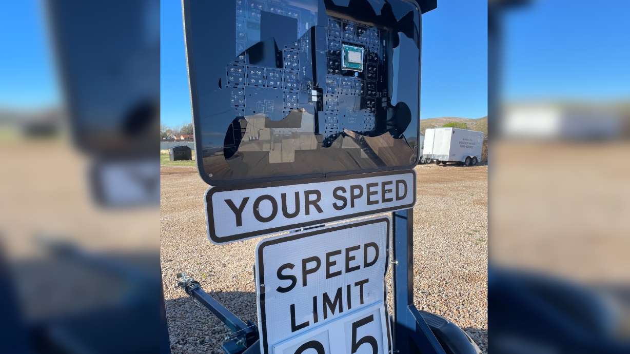 A radar speed display sign and attached trailer were destroyed after being struck multiple times by a baseball bat, police say. Two suspects are in jail in Hurricane, Washington County.