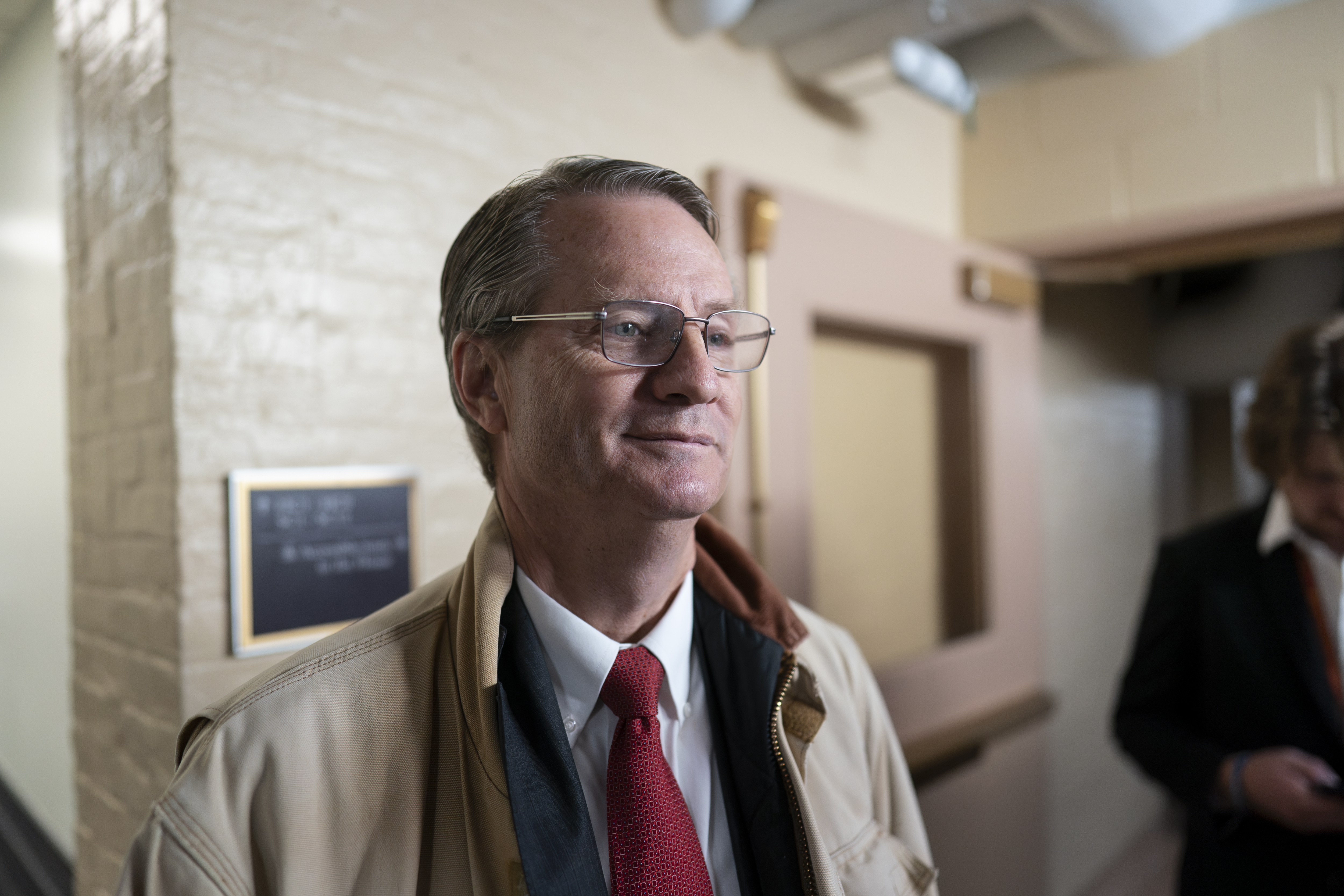 FILE- Rep. Tim Burchett, R-Tenn., talks with reporters before going into a closed-door meeting of fellow Republicans to discuss funding the government, at the Capitol in Washington, Tuesday, Nov. 14, 2023. A man who was briefly handcuffed in the chaos that followed a deadly shooting at the Kansas City Chiefs’ Super Bowl rally is suing the Tennessee congressman who falsely accused him in social media posts of being one of the shooters and an immigrant in the country illegally. 