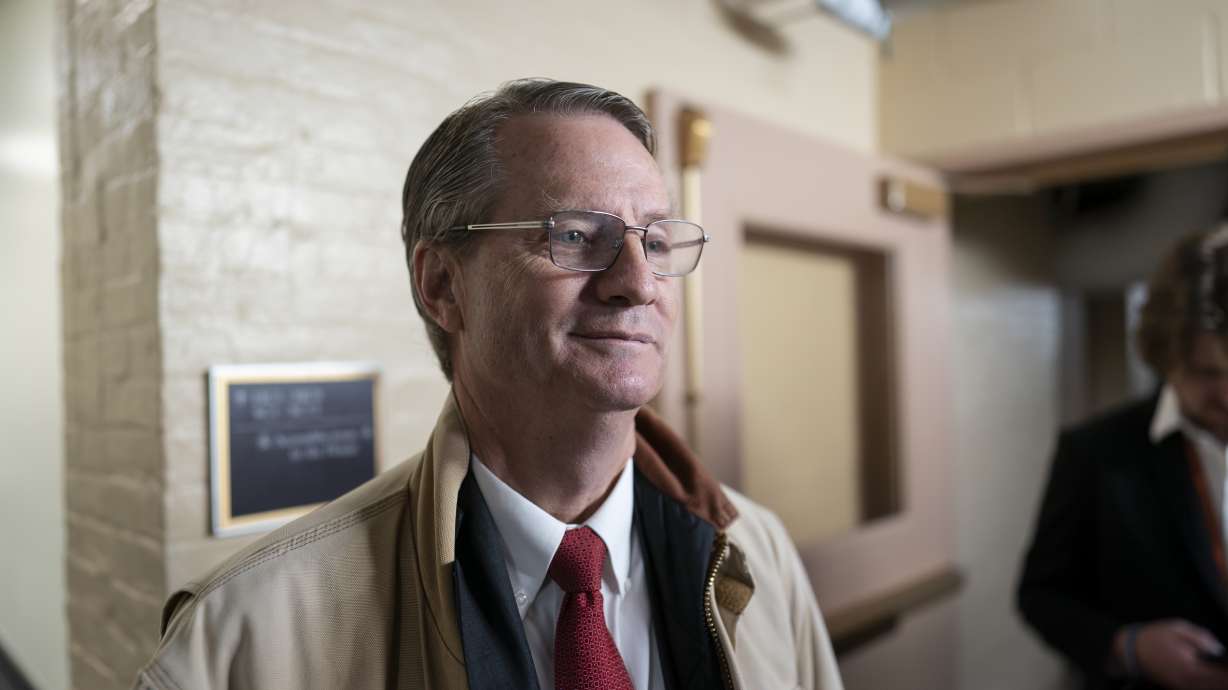 FILE- Rep. Tim Burchett, R-Tenn., talks with reporters before going into a closed-door meeting of fellow Republicans to discuss funding the government, at the Capitol in Washington, Tuesday, Nov. 14, 2023. A man who was briefly handcuffed in the chaos that followed a deadly shooting at the Kansas City Chiefs’ Super Bowl rally is suing the Tennessee congressman who falsely accused him in social media posts of being one of the shooters and an immigrant in the country illegally.