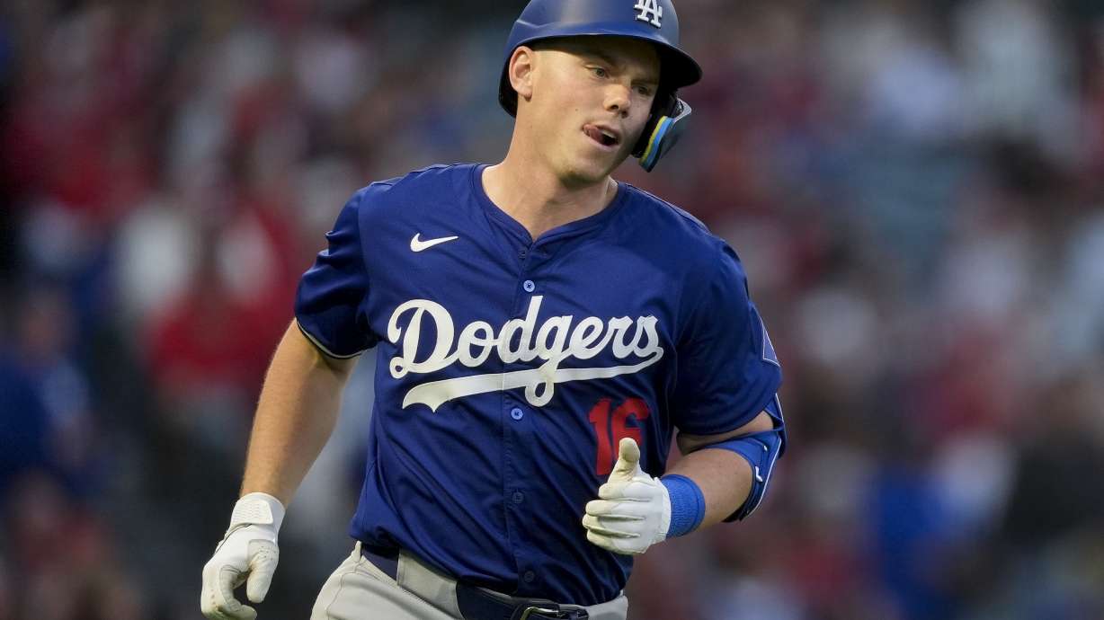 Los Angeles Dodgers' Will Smith runs hitting a home run during the fourth inning of the team's exhibition baseball game against the Los Angeles Angels, Tuesday, March 26, 2024, in Anaheim, Calif.
