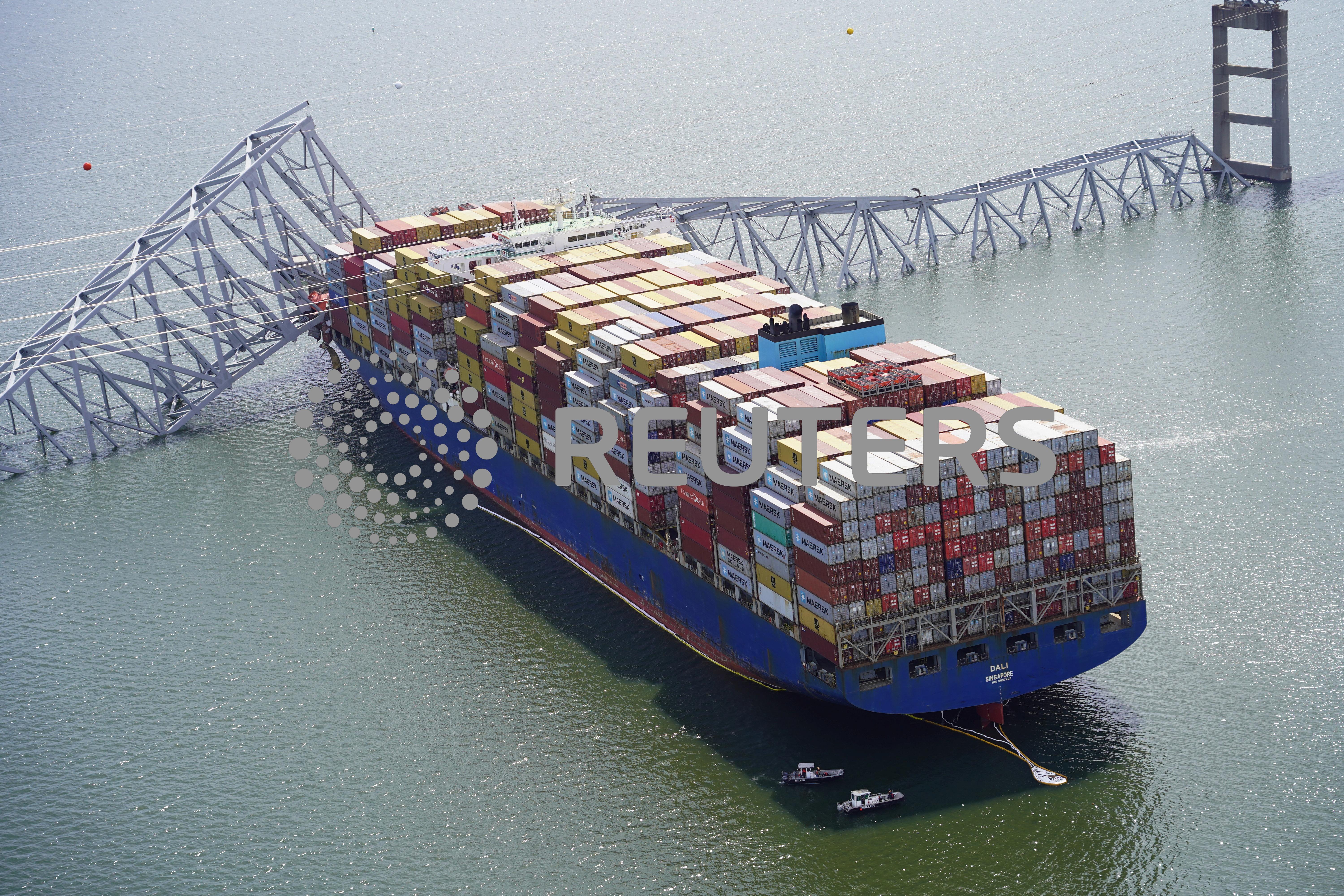 Aerial view shows the Dali cargo vessel that crashed into the Francis Scott Key Bridge, causing it to collapse in Baltimore, Md., Tuesday.