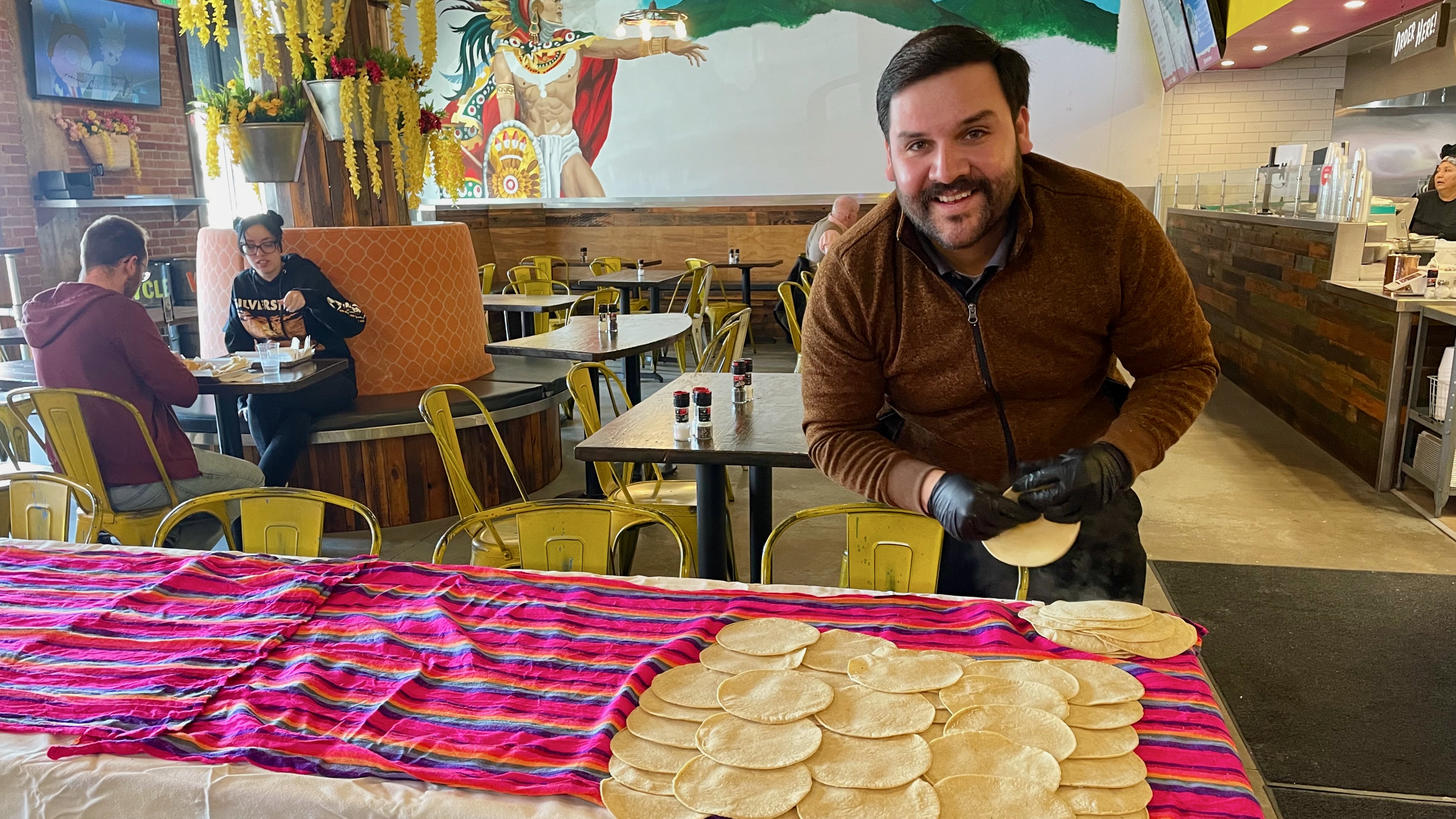 Armando Guerrero, owner and operator of House of Corn Mexican Cuisine in Salt Lake City, prepares freshly cooked tortillas on Tuesday. The locale opened the Salt Lake City location on March 9.