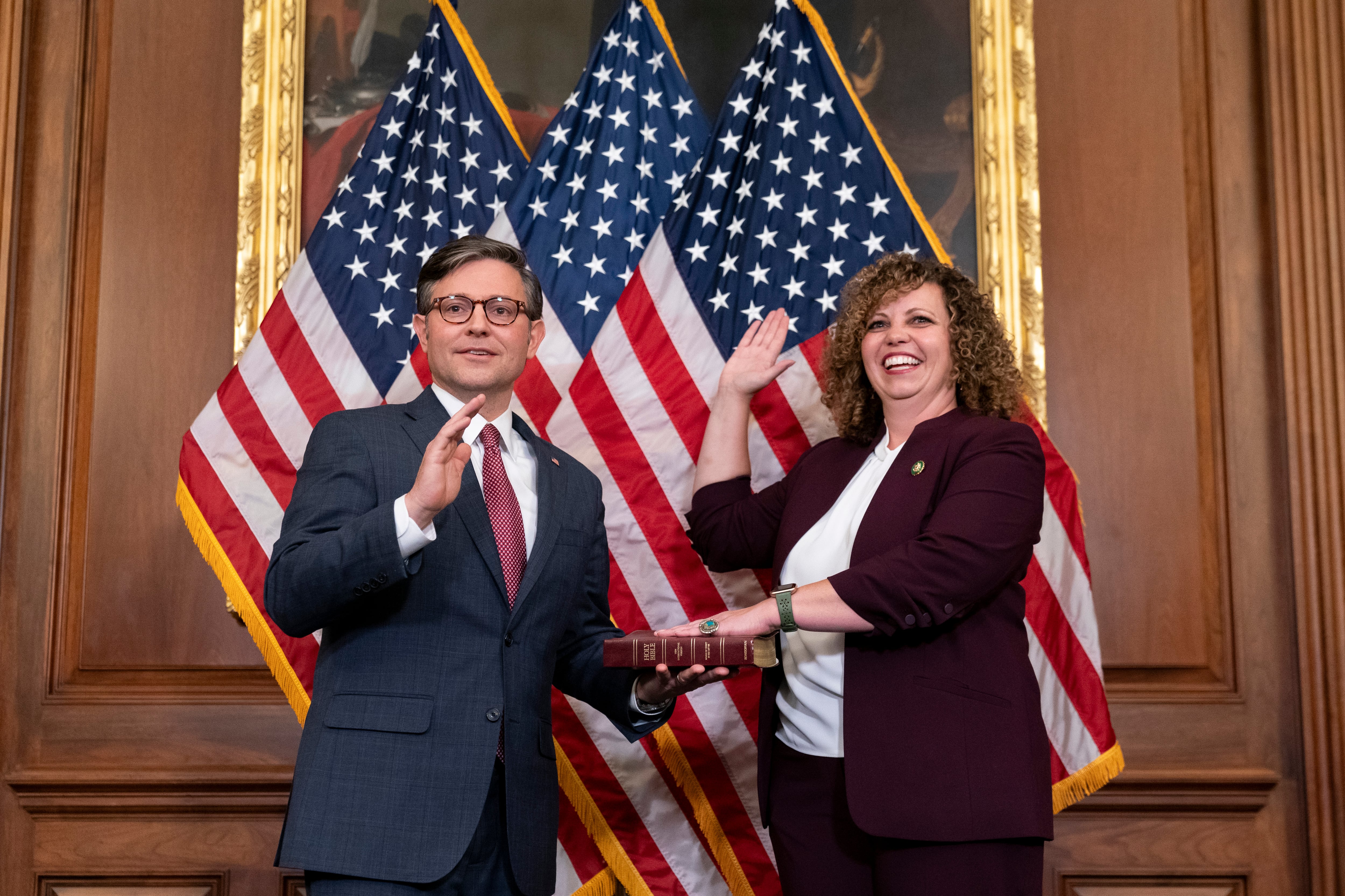 Speaker of the House Mike Johnson, R-La., ceremonially swears in Celeste Maloy, R-Utah, to the House of Representatives to succeed former Rep. Chris Stewart, Nov. 28, 2023, on Capitol Hill in Washington.