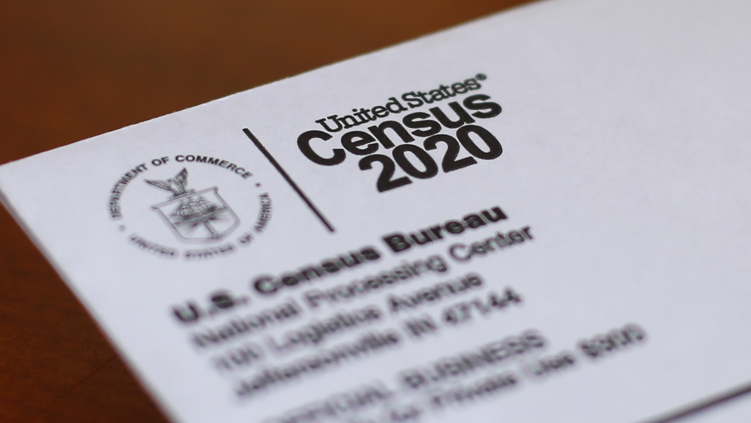 An envelope containing a 2020 census letter mailed to a U.S. resident is seen, April 5, 2020, in Detroit. For the first time in 27 years, the U.S. government on March 28, changed how it categorizes people by race and ethnicity, an effort that federal officials believe will more accurately count residents who identify as Hispanic and of Middle Eastern and North African heritage.