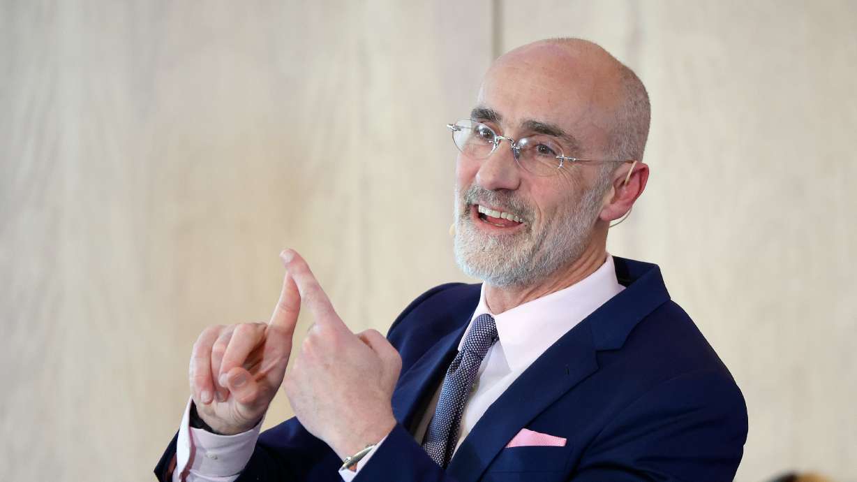 Harvard professor and author Arthur Brooks speaks about happiness at the Gordon B. Hinckley Alumni and Visitors Center at BYU in Provo on Thursday.