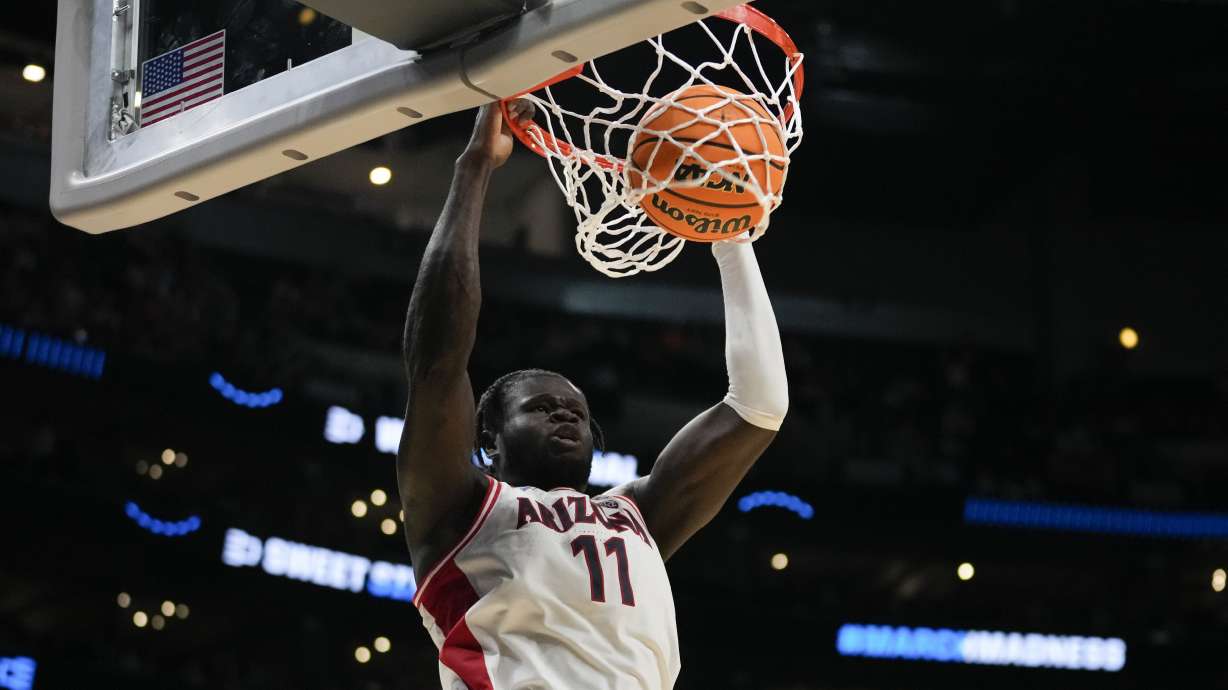 Arizona center Oumar Ballo (11) dunks during the second half of a Sweet 16 college basketball game against Clemson in the NCAA tournament Thursday, March 28, 2024, in Los Angeles.