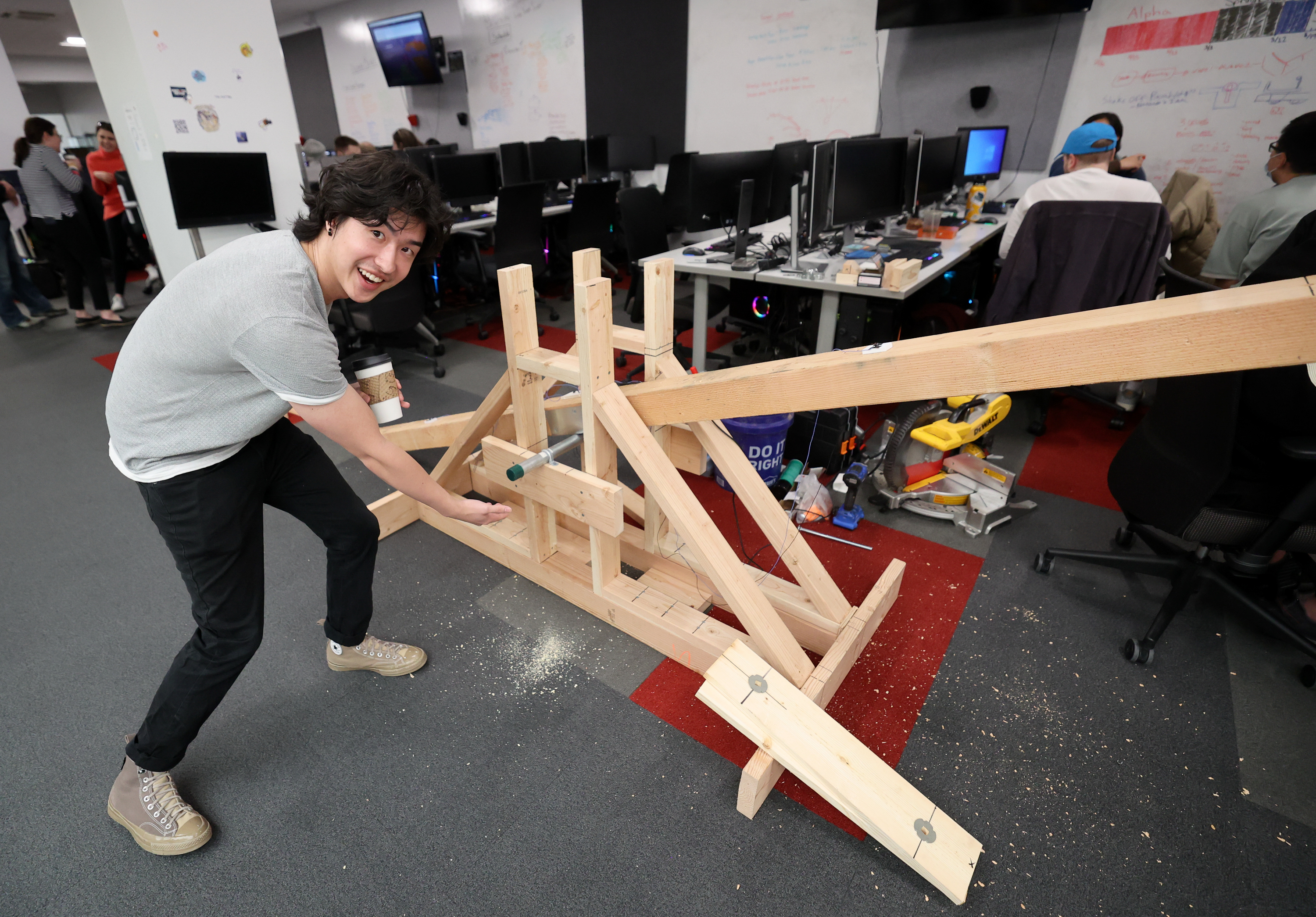 Masters of Entertainment Arts and Engineering graduate student Steven Pasinsky shows a seesaw that is part of a game he is lead producing called Back Off Me Booty in Building 72, the former law library, at the University of Utah in Salt Lake City on Tuesday.