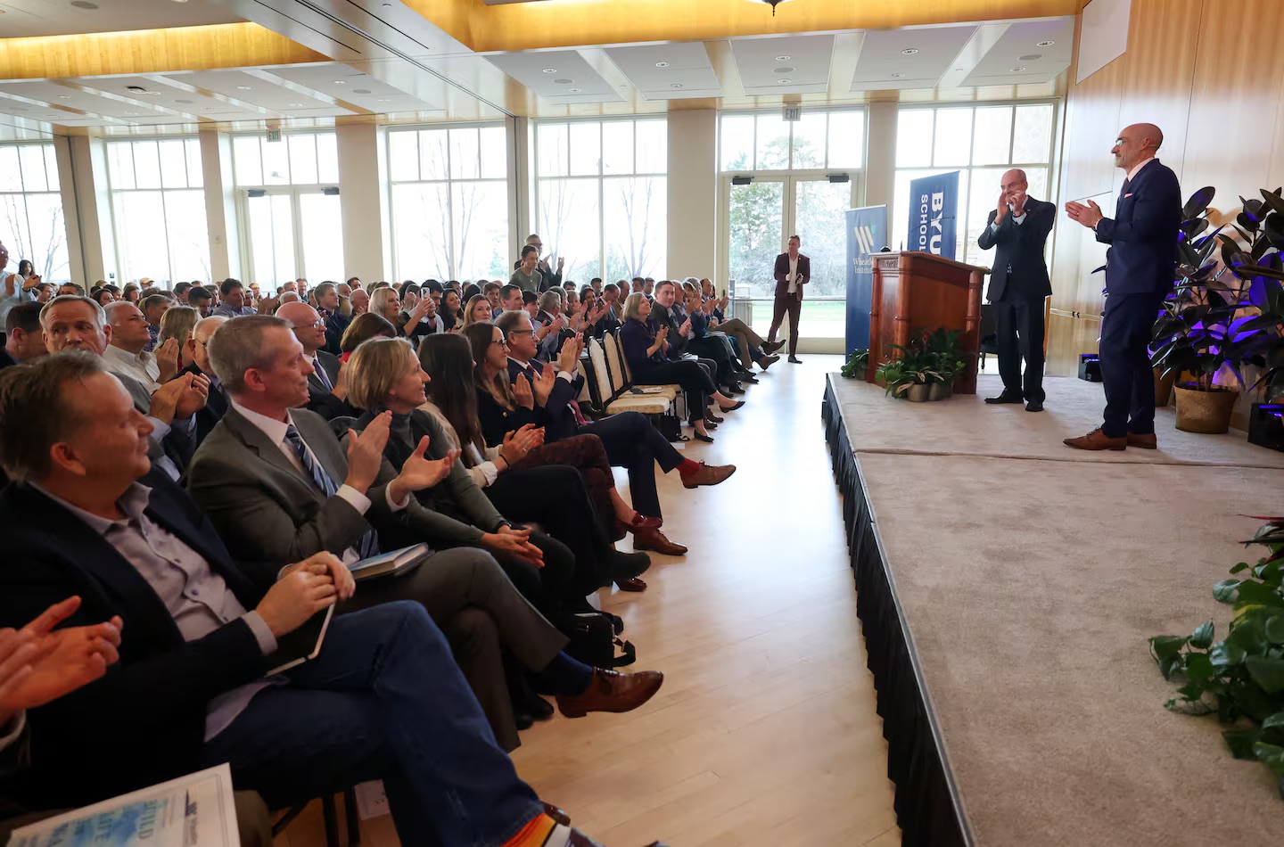 The audience applauds Harvard professor and author Arthur Brooks, who spoke about happiness at the Gordon B. Hinckley Alumni and Visitors Center at BYU, hosted by the Wheatley Institute, University of Utah and the Marriott School of Business, in Provo on Thursday.