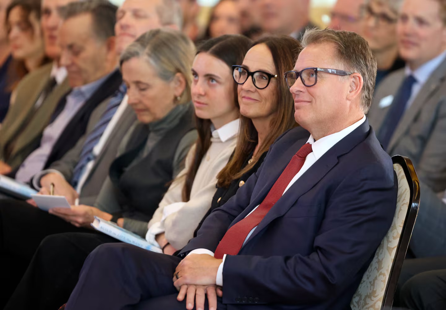 University of Utah President Taylor R. Randall listens to Harvard professor and author Arthur Brooks speak about happiness at the Gordon B. Hinckley Alumni and Visitors Center at BYU in Provo on Thursday. The talk was hosted by the Wheatley Institute, University of Utah and the Marriott School of Business.