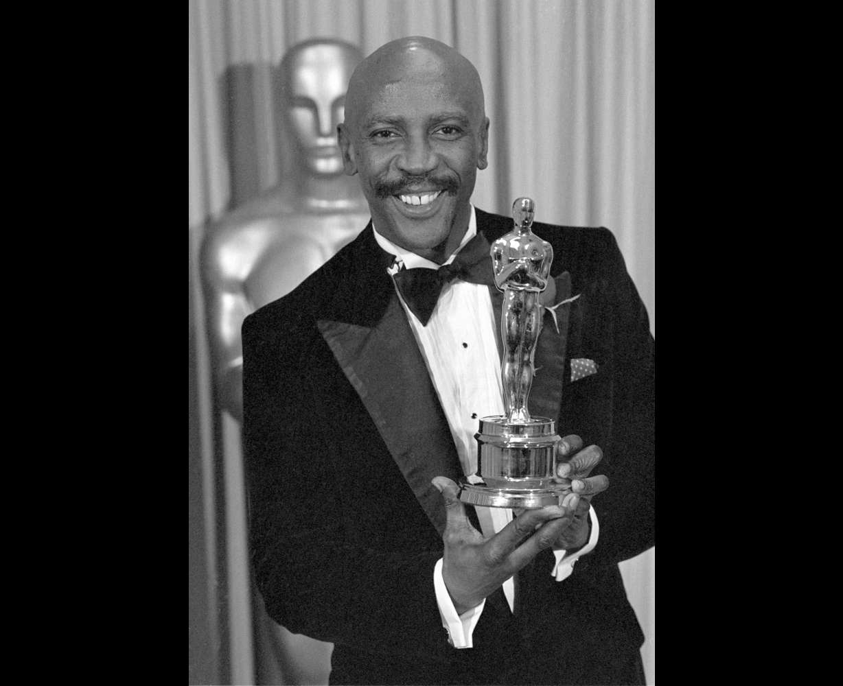 Louis Gossett Jr., poses with the Oscar for best supporting actor for his role in "An Officer and a Gentleman," at the annual Academy Awards presentation in Los Angeles on April 11, 1983.