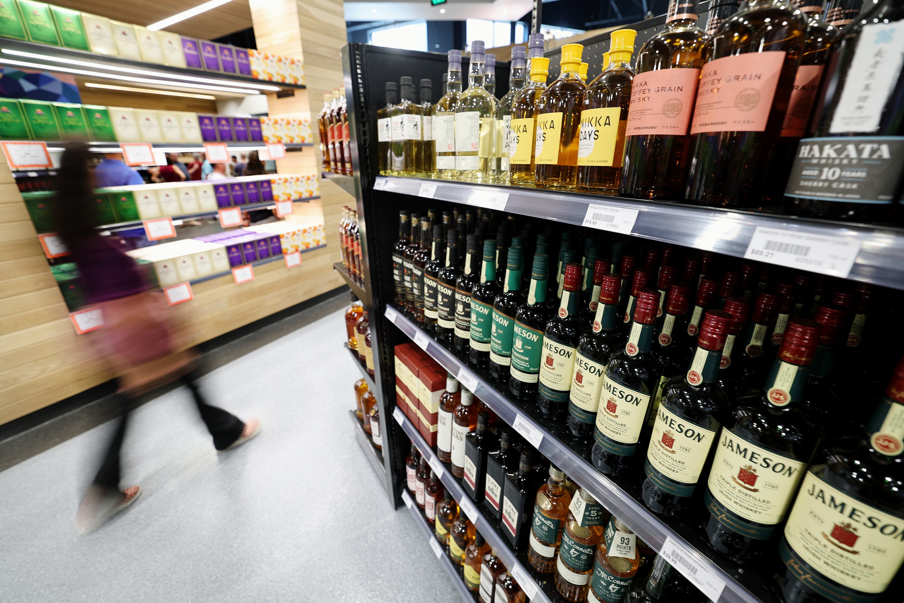 Product at the new State Liquor Store as it opens in Sandy on July 31, 2023. Women who average more than one alcoholic beverage a day are more likely to develop coronary heart disease than peers who drink less, according to a new study.
