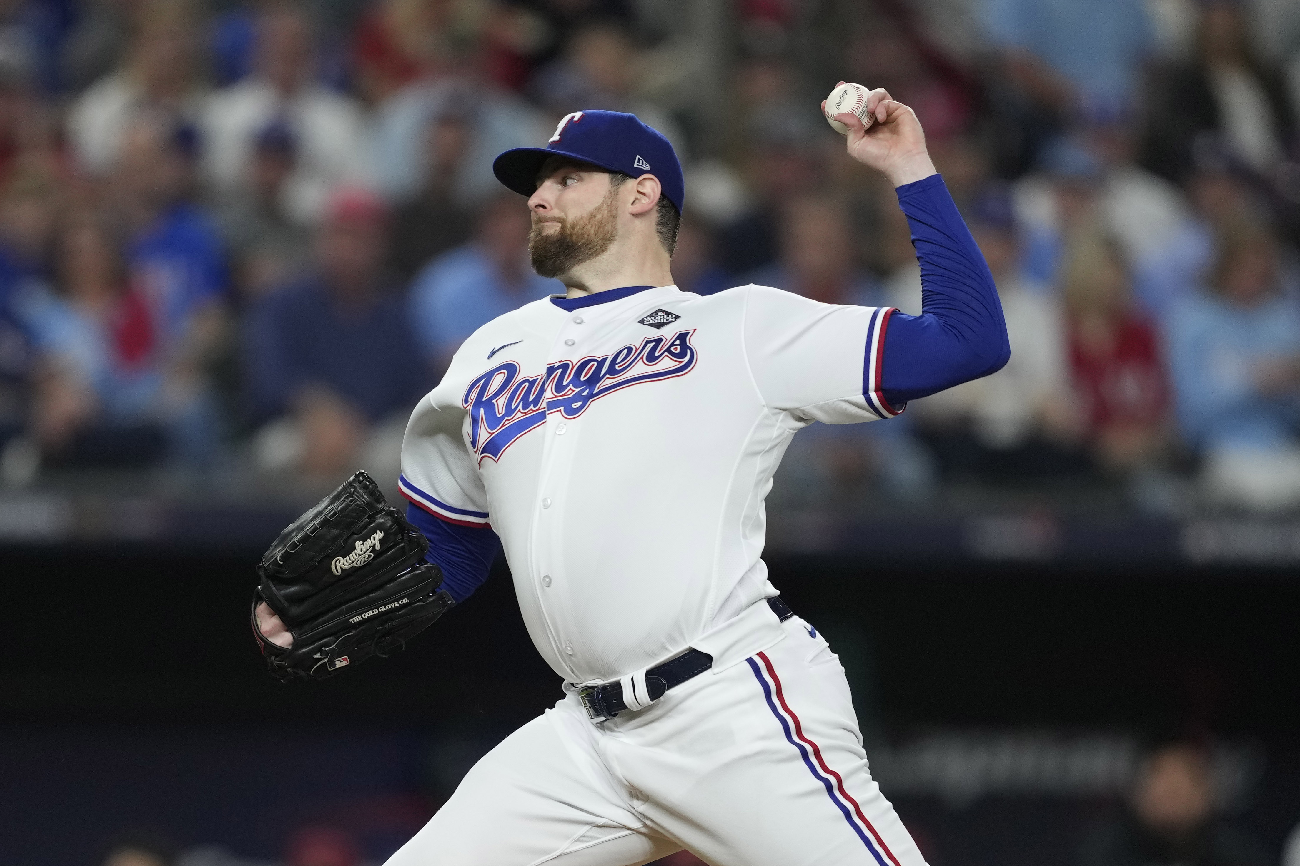 FILE - Texas Rangers starting pitcher Jordan Montgomery throws to an Arizona Diamondbacks batter during the first inning in Game 2 of the baseball World Series, Oct. 28, 2023, in Arlington, Texas. The Diamondbacks have agreed with Montgomery on a $25 million, one-year deal with a vesting option for 2025, according to a person familiar with the deal. The person spoke to The Associated Press on condition of anonymity Tuesday, March 26, because Montgomery still has to pass a physical. 