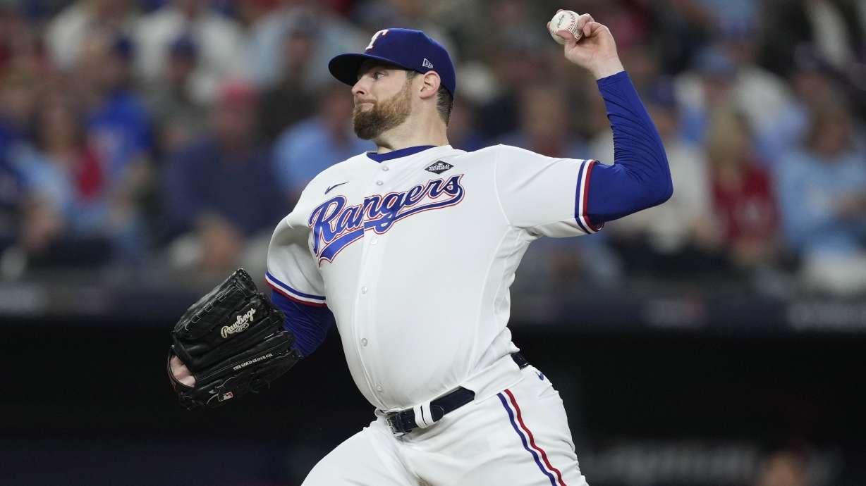 FILE - Texas Rangers starting pitcher Jordan Montgomery throws to an Arizona Diamondbacks batter during the first inning in Game 2 of the baseball World Series, Oct. 28, 2023, in Arlington, Texas. The Diamondbacks have agreed with Montgomery on a $25 million, one-year deal with a vesting option for 2025, according to a person familiar with the deal. The person spoke to The Associated Press on condition of anonymity Tuesday, March 26, because Montgomery still has to pass a physical.
