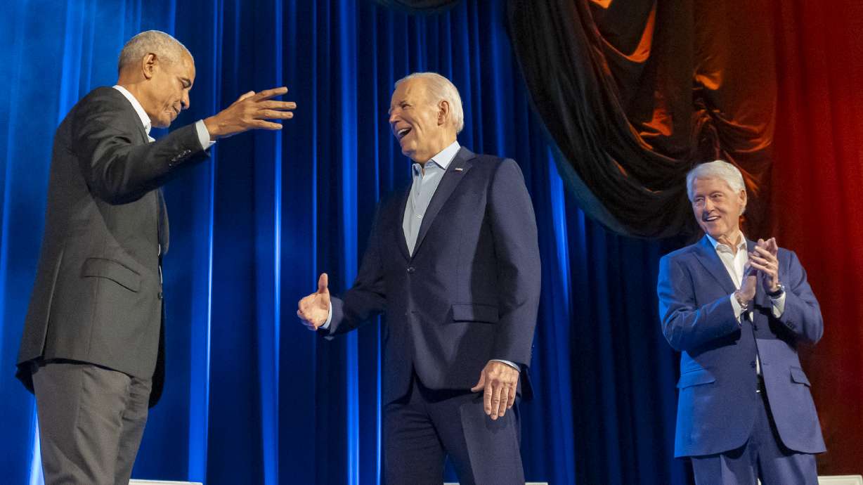 President Joe Biden, center, and former presidents Barack Obama and Bill Clinton participate in a fundraising event with Stephen Colbert at Radio City Music Hall, Thursday, in New York. Biden's reelection campaign has an election-year strategy that, in a nutshell, aims to spend more — and spend faster.