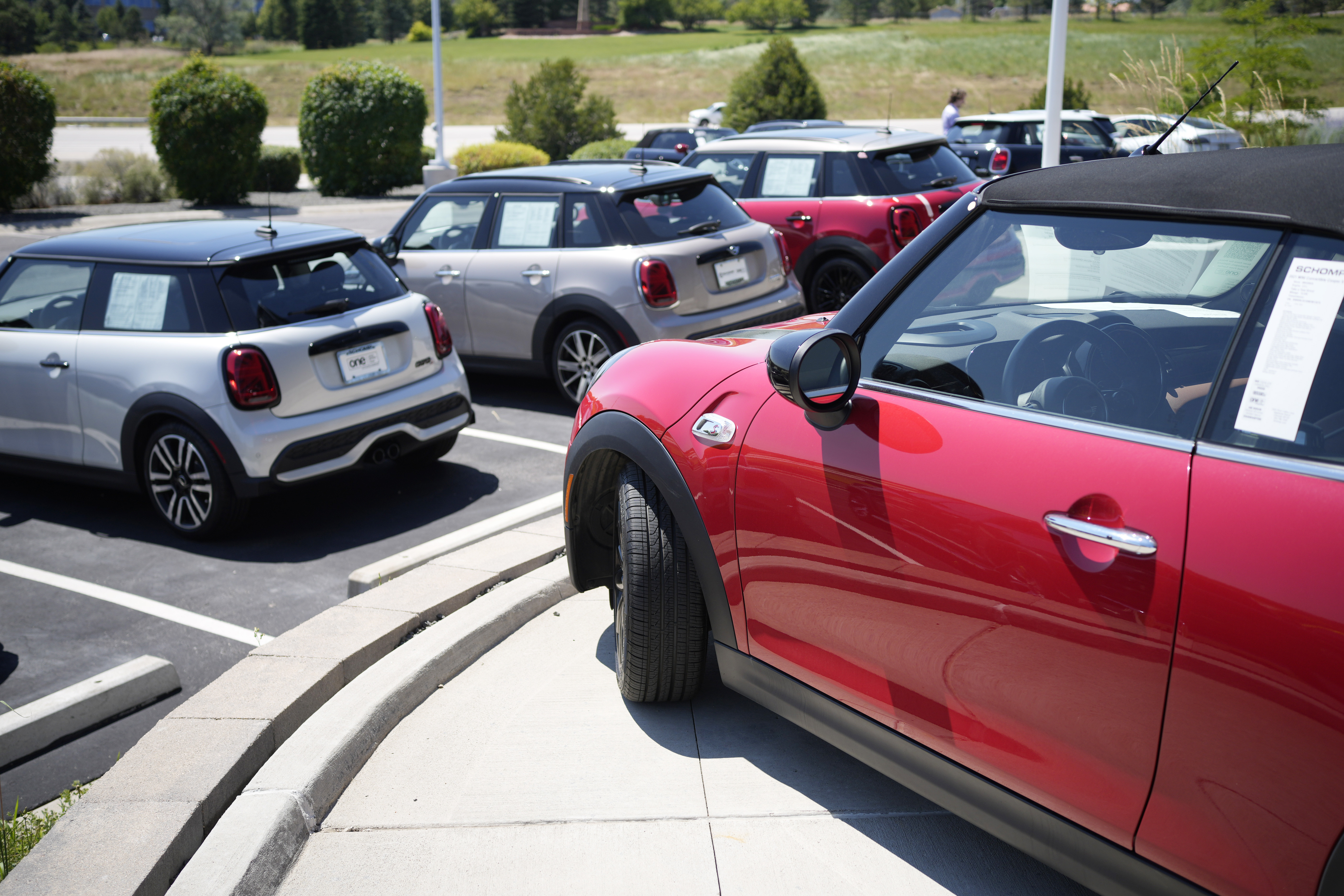 Used models are shown a Mini dealership on July 21, 2023, in Highlands Ranch, Colo. The average used car price is up 16% from three years ago.