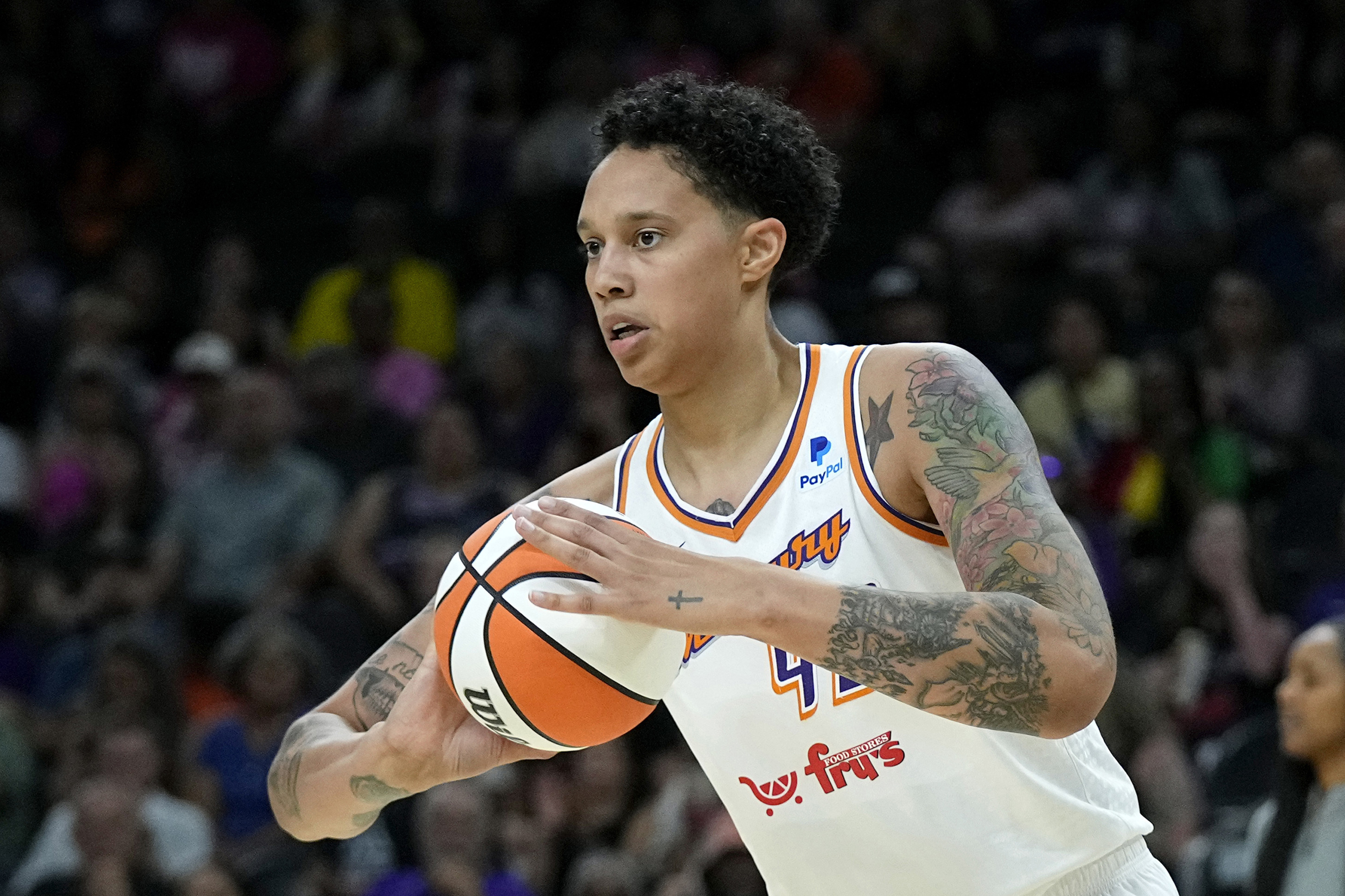 FILE - Phoenix Mercury center Brittney Griner grabs a rebound against the Seattle Storm during the first half of a WNBA basketball game Saturday, Aug. 5, 2023, in Phoenix. Griner has re-signed with the Phoenix Mercury, the only WNBA team she has ever played for. The deal was announced on by the league on X, formerly Twitter, on Friday, March 29, 2024. 