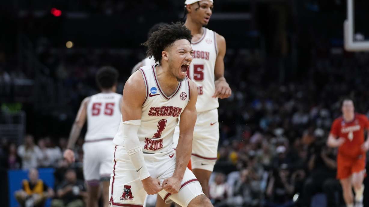 Alabama guard Mark Sears (1) celebrates after scoring during the first half of an Elite 8 college basketball game against Clemson in the NCAA tournament Saturday, March 30, 2024, in Los Angeles.