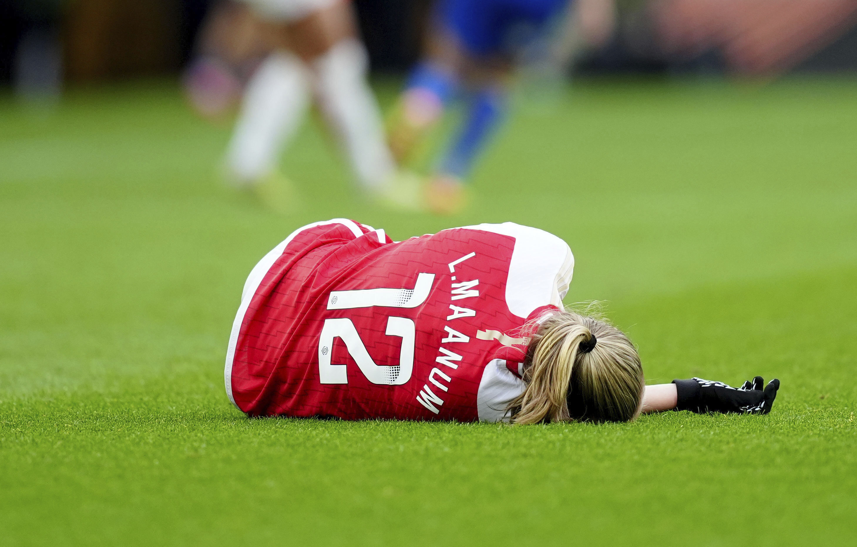Arsenal's Frida Maanum goes down during the FA Women's Continental Tyres League Cup Final at Molineux Stadium, Wolverhampton, England, Sunday March 31, 2024. 