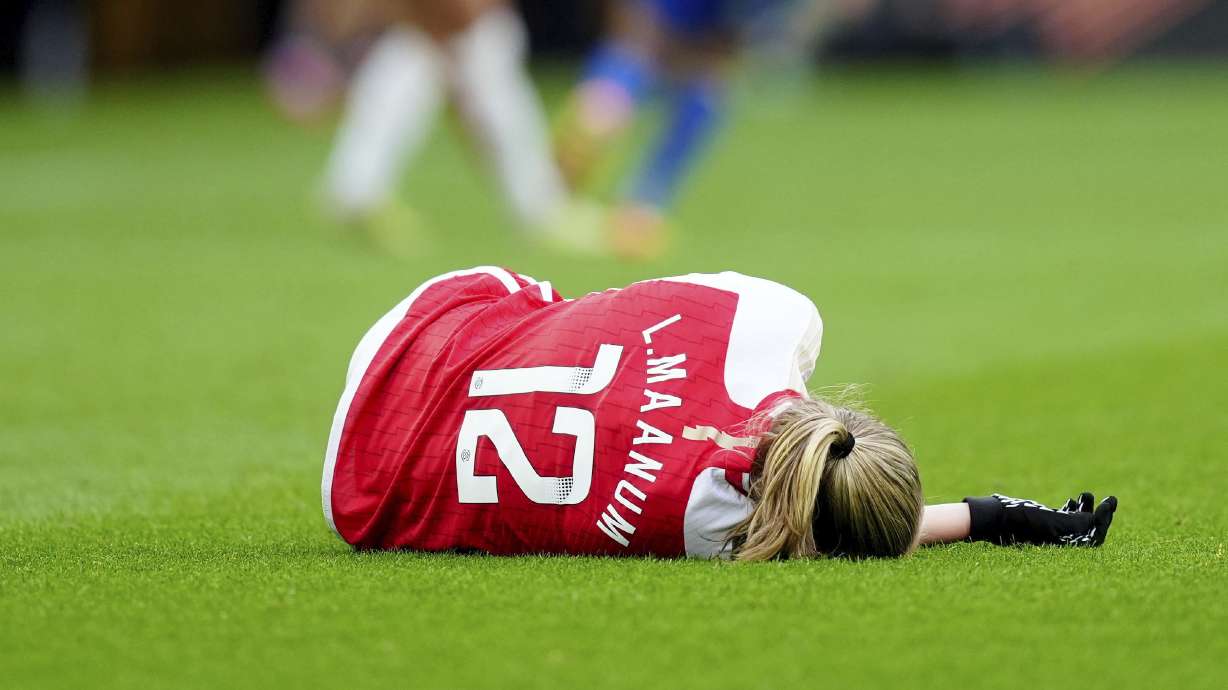 Arsenal's Frida Maanum goes down during the FA Women's Continental Tyres League Cup Final at Molineux Stadium, Wolverhampton, England, Sunday March 31, 2024.