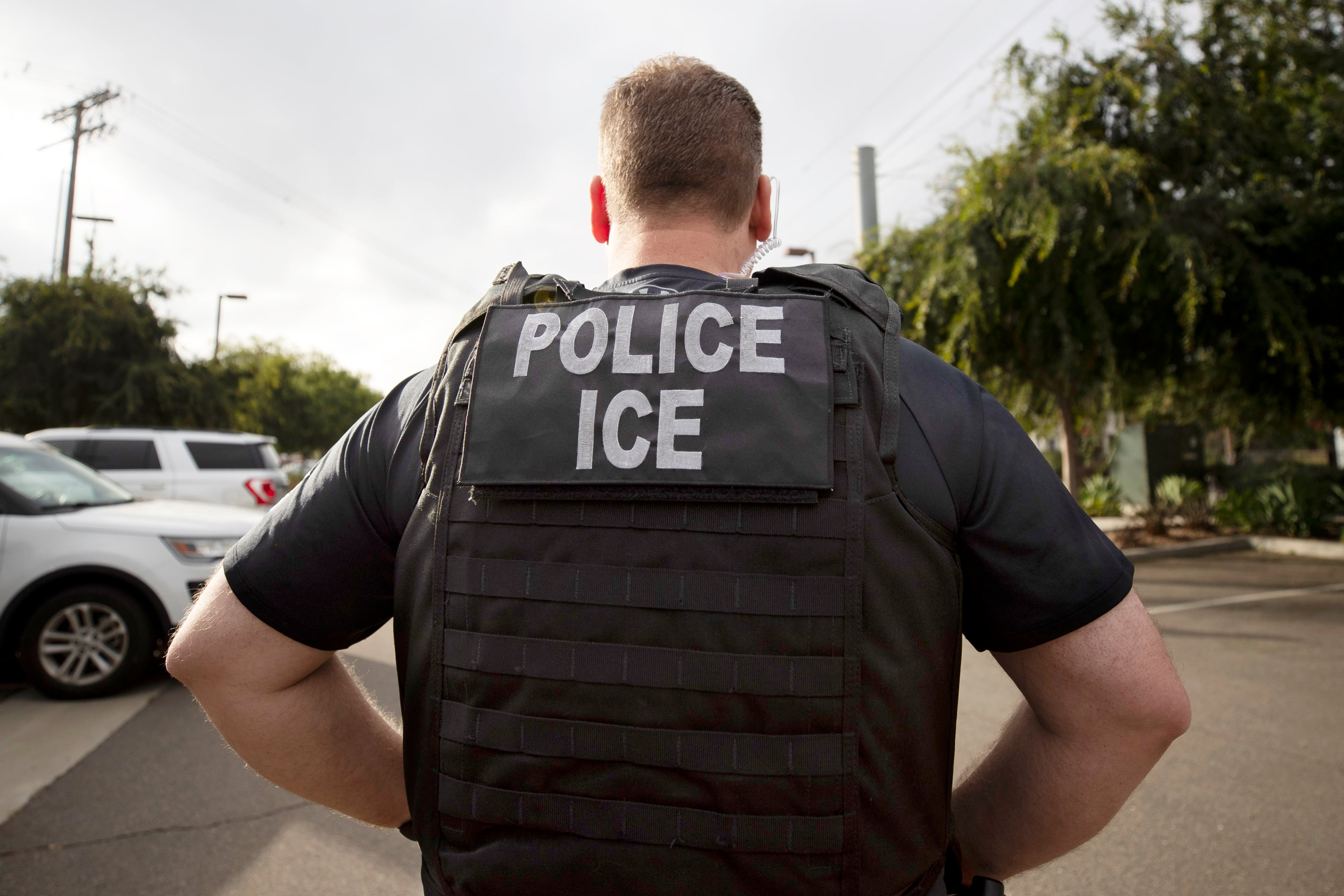 A U.S. Immigration and Customs Enforcement officer in Escondido, Calif., July 8, 2019. Immigration enforcement arrests in the interior of the U.S. fell in the past year as the Biden administration shifted its focus to people who have committed crimes.