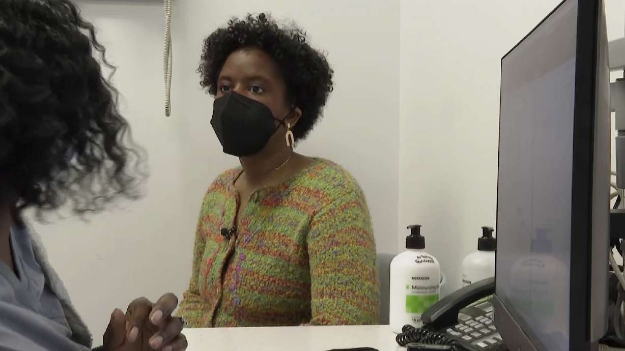 Jazmin Evans, a student at Temple University, meets with a doctor at Jefferson Health in Philadelphia on Feb. 16. Evans should have been put on the transplant list in 2015 instead of 2019 — and a racially biased organ test was to blame.