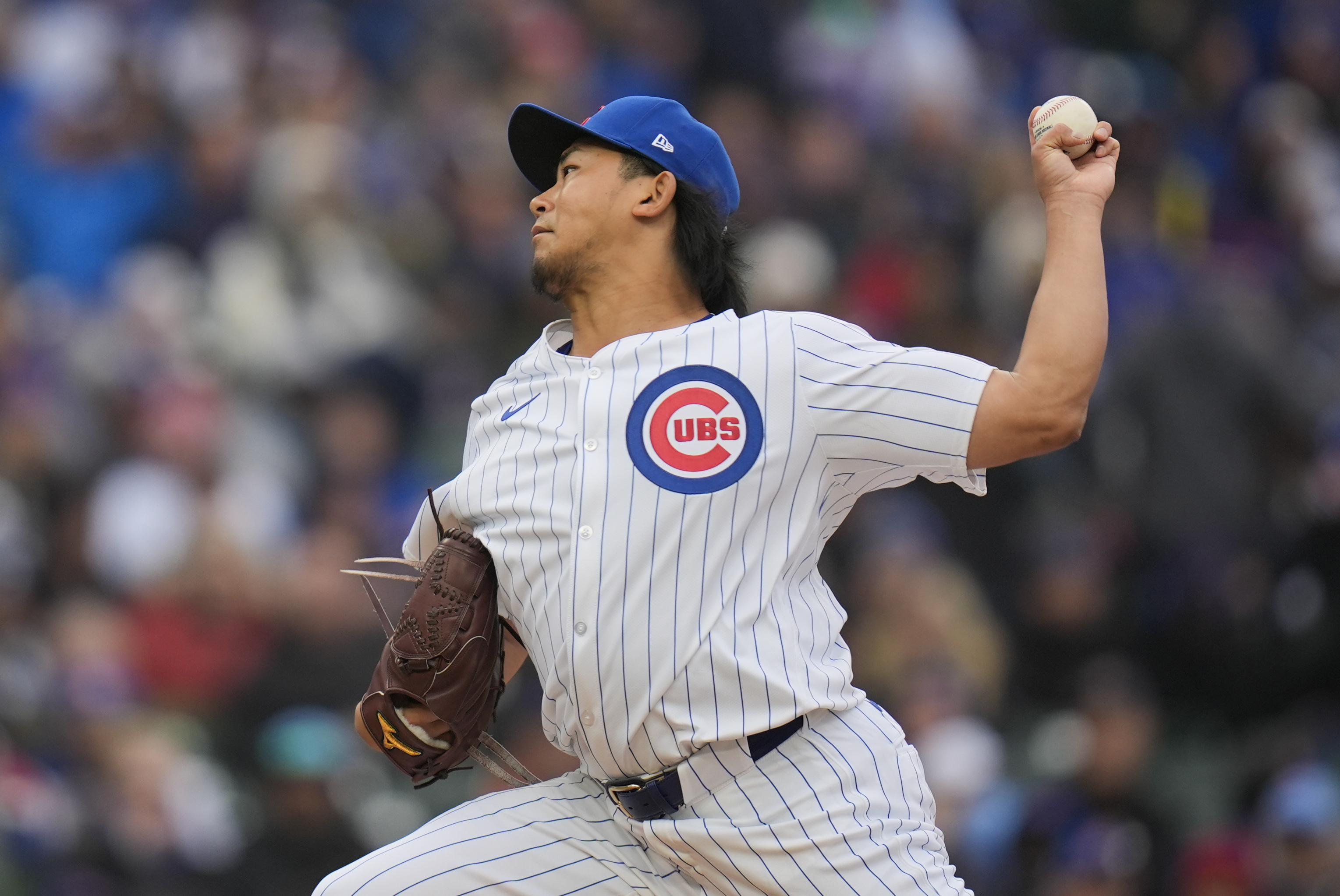 Chicago Cubs starting pitcher Shota Imanaga throws against the Colorado Rockies during the first inning of a baseball game Monday, April 1, 2024, in Chicago. 