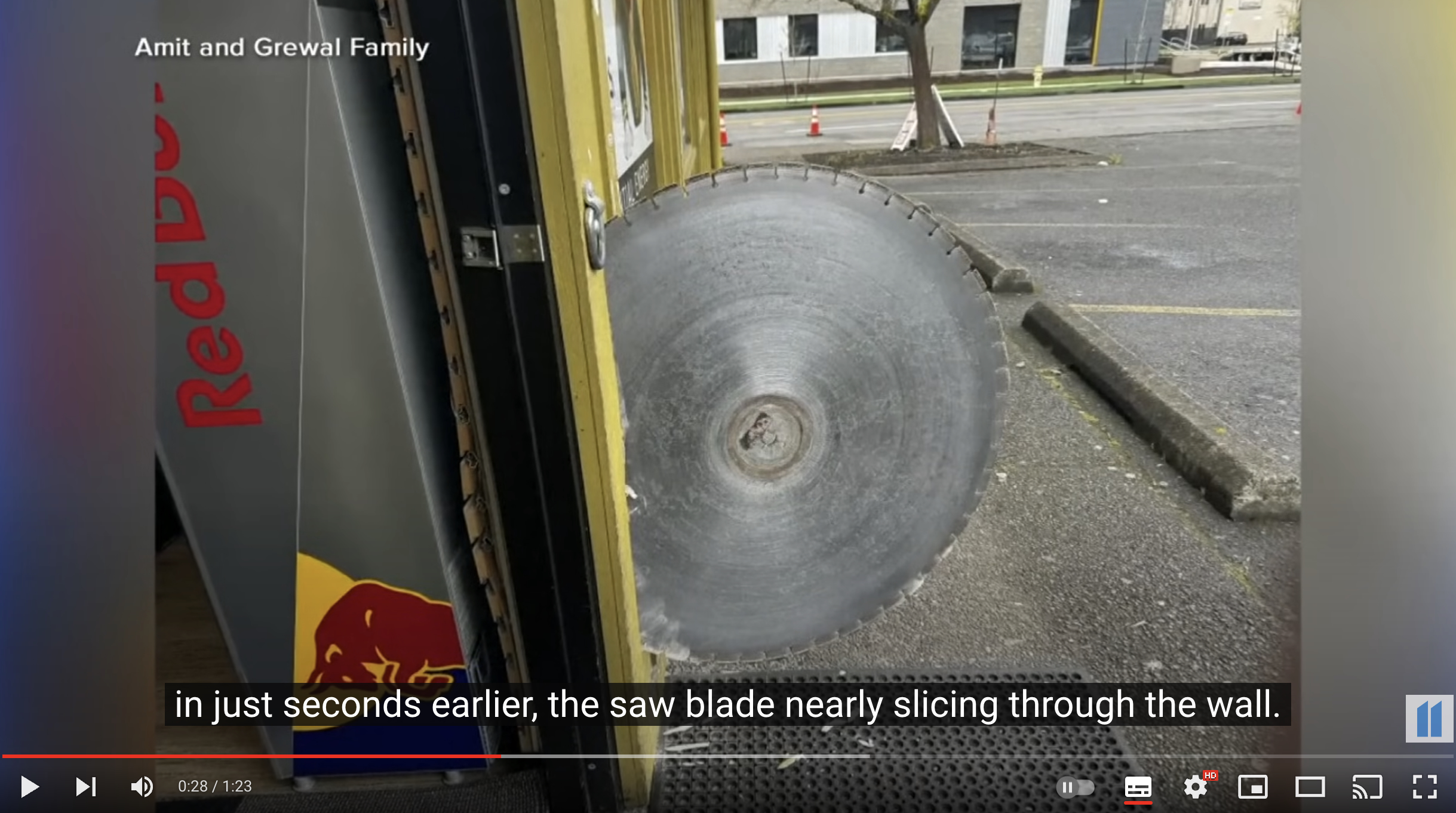 A 4-foot concrete saw blade broke loose from a nearby construction site and zipped across the store parking lot before embedding itself into the store's exterior wall, just inches away from the door that a man had just entered.