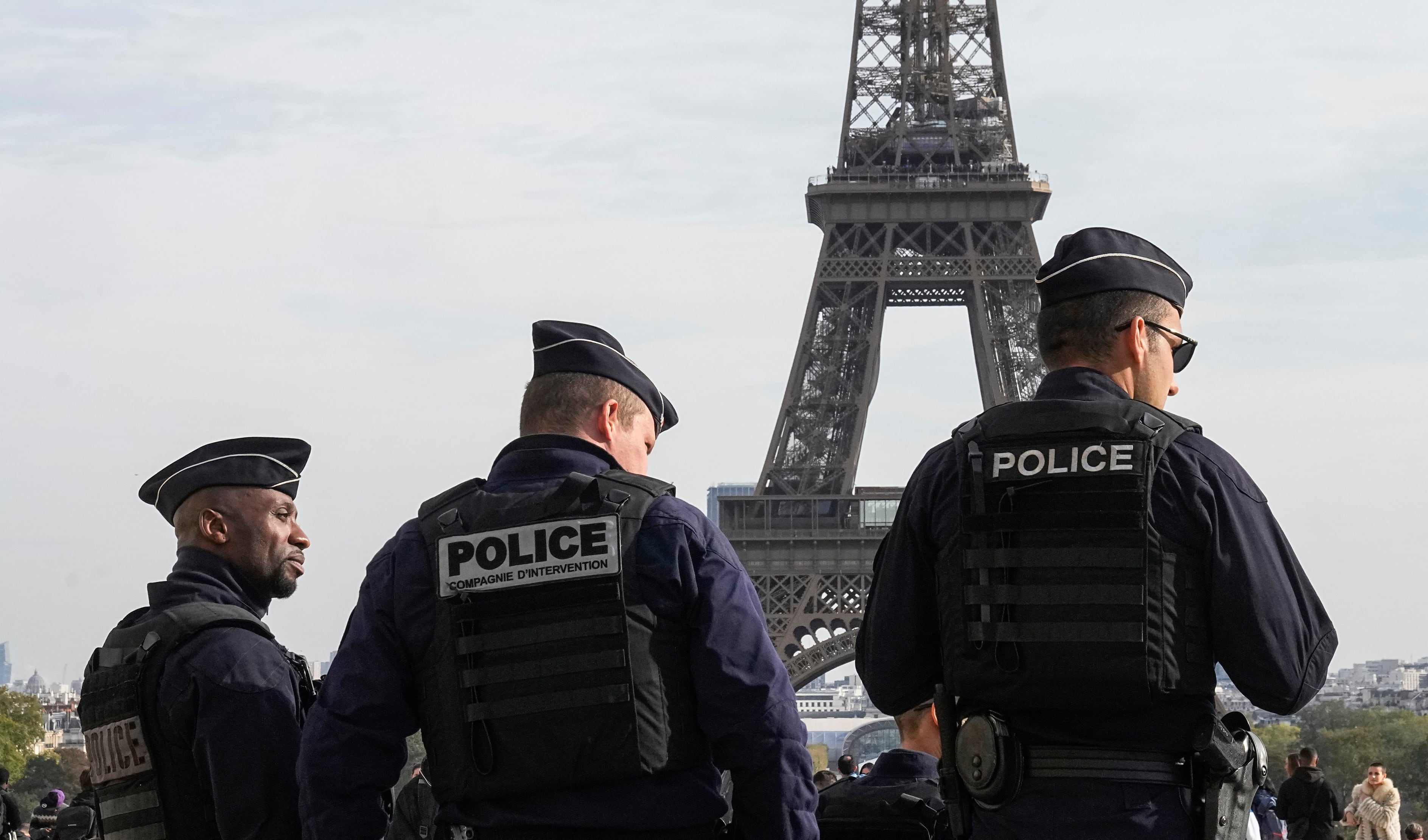 Police officers patrol the Trocadero plaza near the Eiffel Tower in Paris, Tuesday, Oct. 17, 2023. France says it has asked 46 countries if they can supply more than 2,000 police officers to help secure the Paris Olympics. Organizers are finalizing security planning for the July 26-Aug. 11 Games, the French capital’s first in a century.