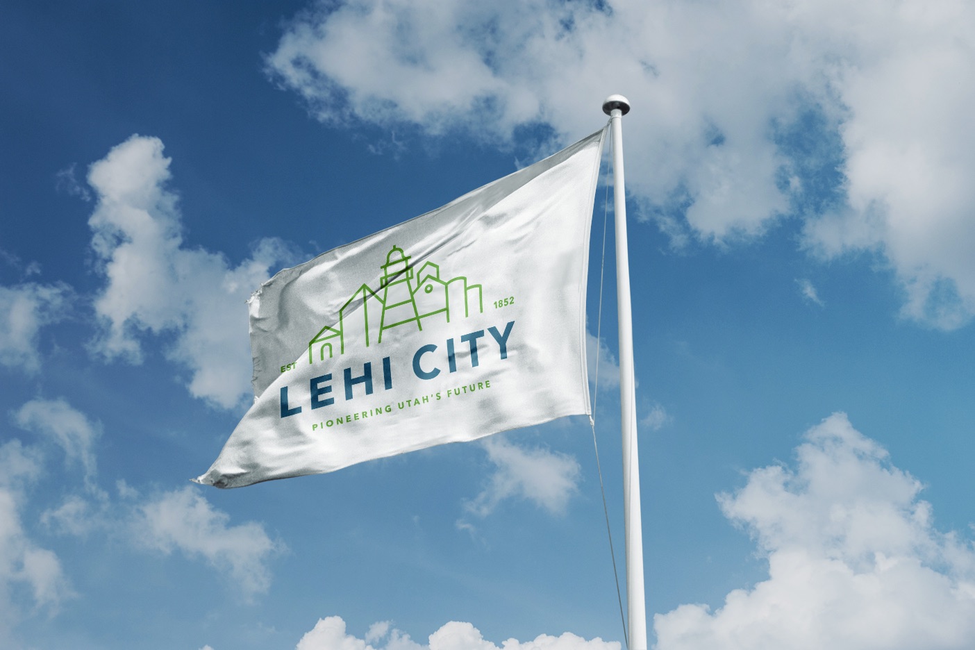 The current city flag for Lehi is the city's logo on a white background. The city is hosting a competition for a flag redesign.