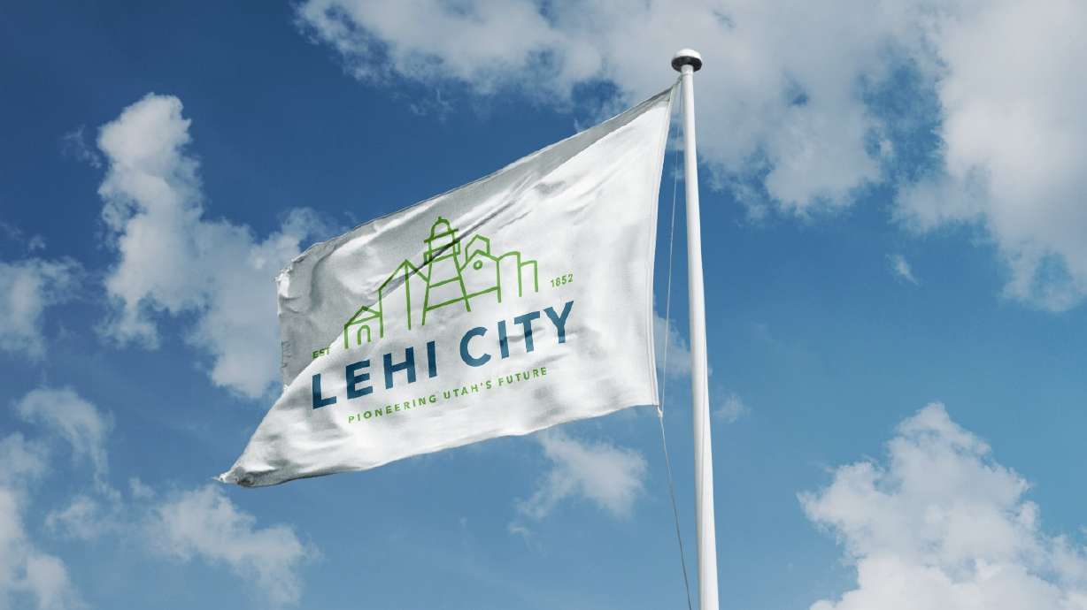 The current city flag for Lehi is the city's logo on a white background. The city is hosting a competition for a flag redesign.