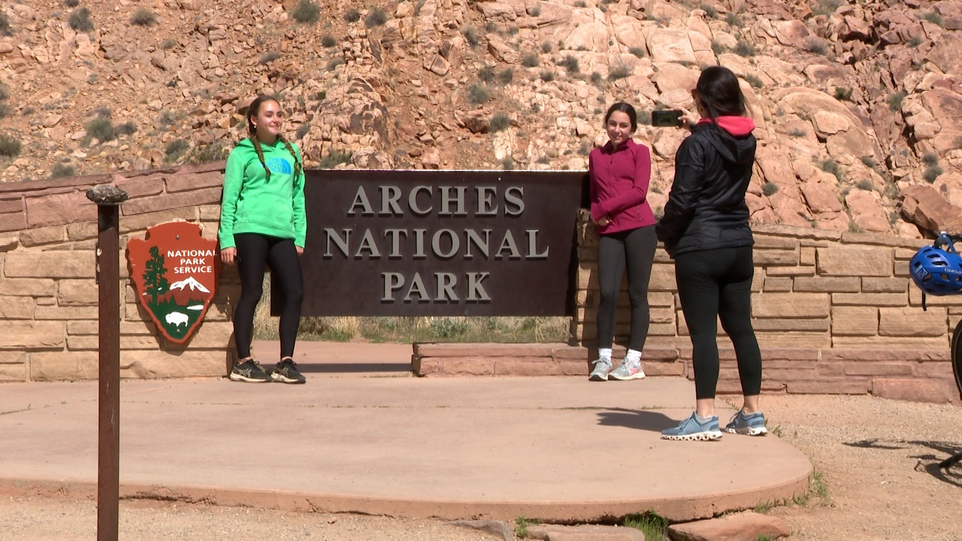 For the third year in a row, Arches National Park is testing a timed-entry system to spread out crowds throughout the day. Visitors to the park are seen here Tuesday.