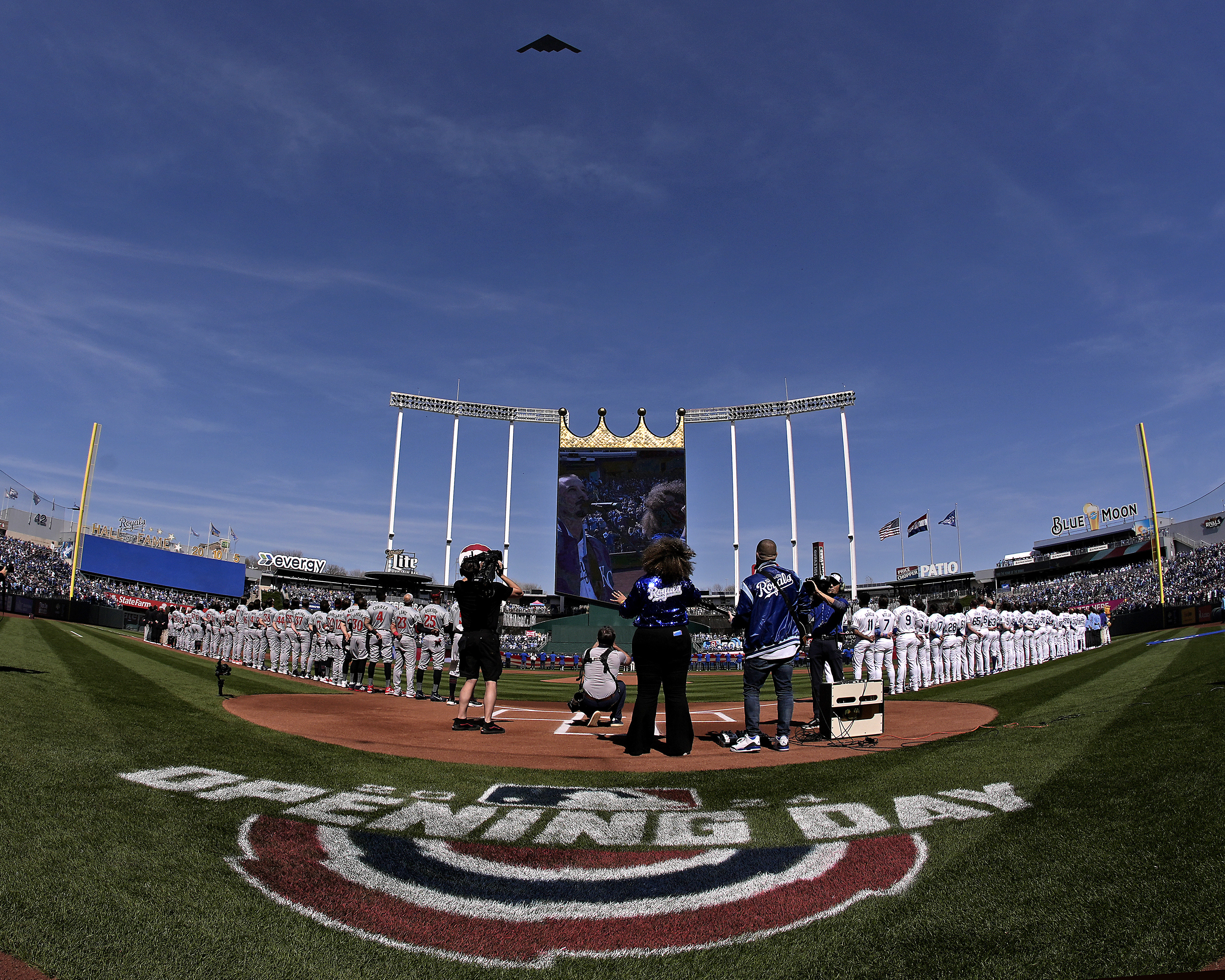 An Air Force B2 bomber flies over Kauffman Stadium before a baseball game between the Kansas City Royals and the Minnesota Twins Thursday, March 28, 2024, in Kansas City, Mo. 