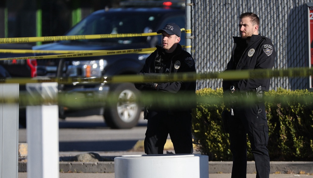 Police investigate a fatal shooting at a Chevron at 875 S. State in Salt Lake City on Tuesday.