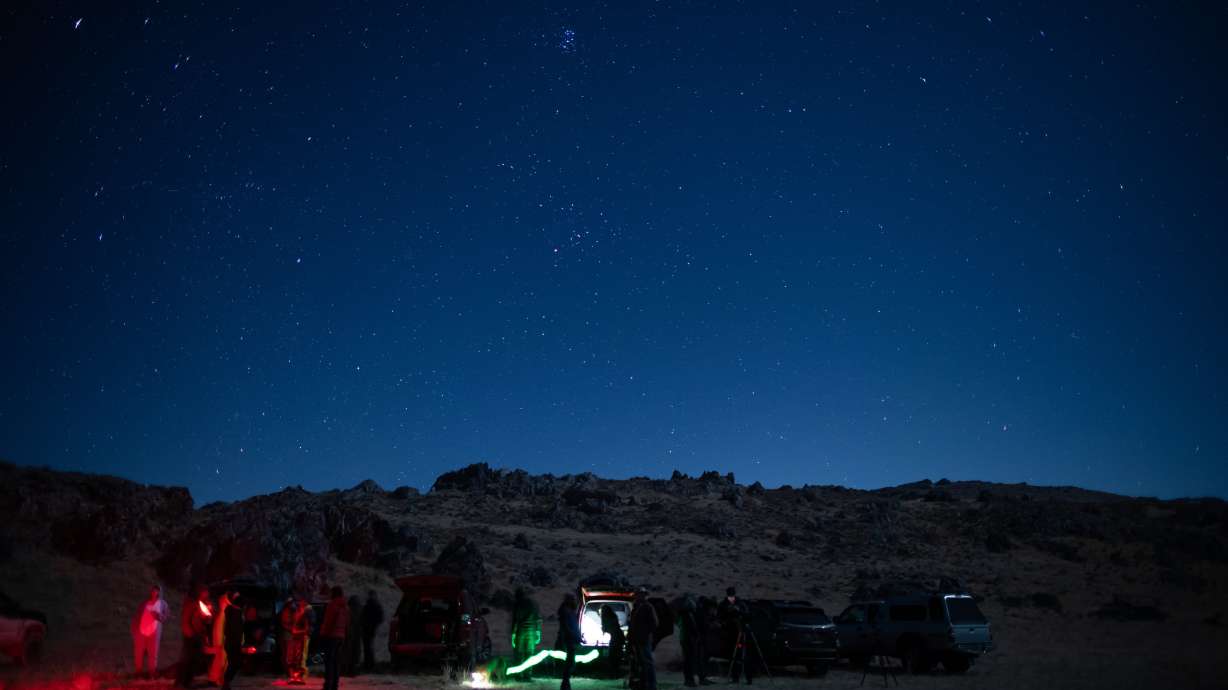 A group gathers to view the “Great Conjunction” of Saturn and Jupiter in the West Desert on Monday, Dec. 21, 2020. For the fourth consecutive year, Gov. Spencer Cox declared April “Dark Sky Month” in Utah.