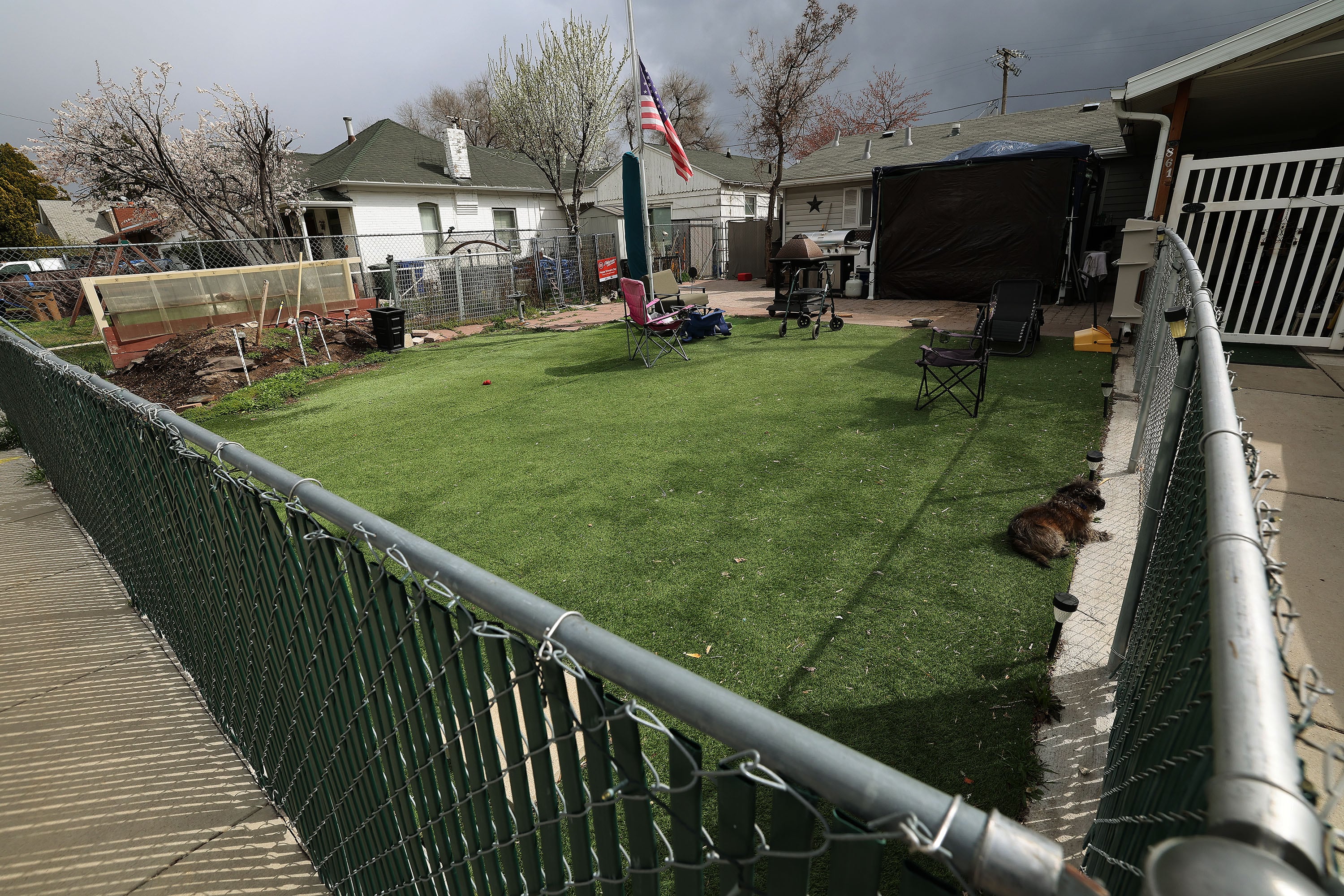 Artificial grass at Troy Vialpando’s home in Salt Lake City on Monday.  Salt Lake City has asked him to remove the grass since it doesn’t meet code.