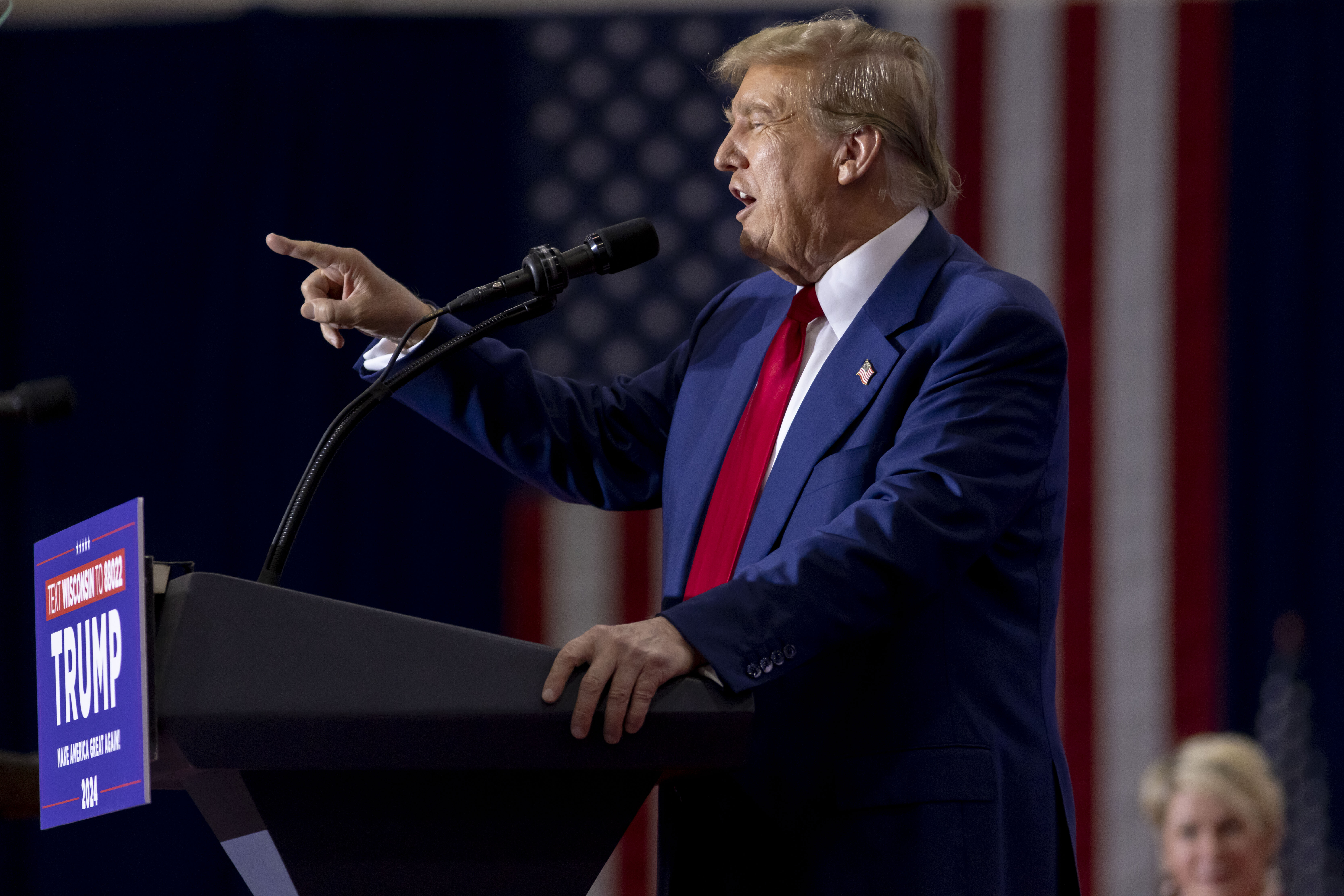 Former President Donald Trump speaks Tuesday at a rally in Green Bay, Wis. Federal prosecutors are scolding the judge presiding over Trump's classified documents case in Florida.