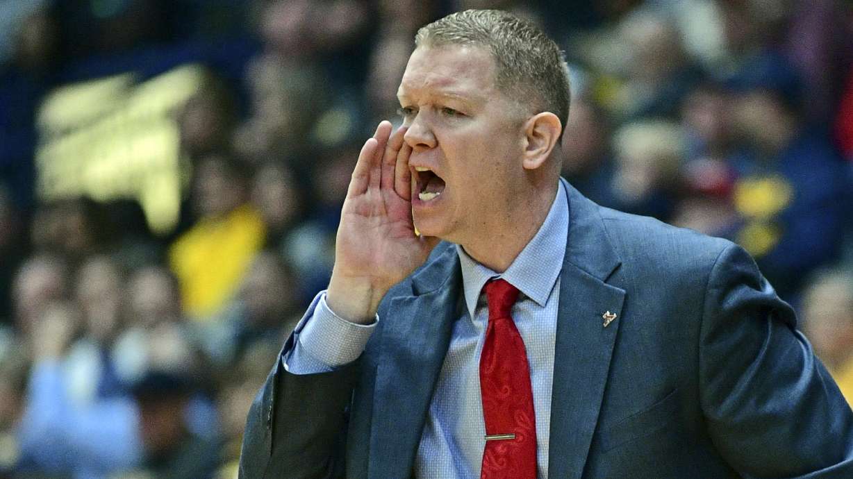 Youngstown State head coach Jerrod Calhoun shouts instructions during a game against West Virginia, Dec. 21, 2019, in Youngstown, Ohio. Calhoun was introduced Tuesday as Utah State's next head coach.