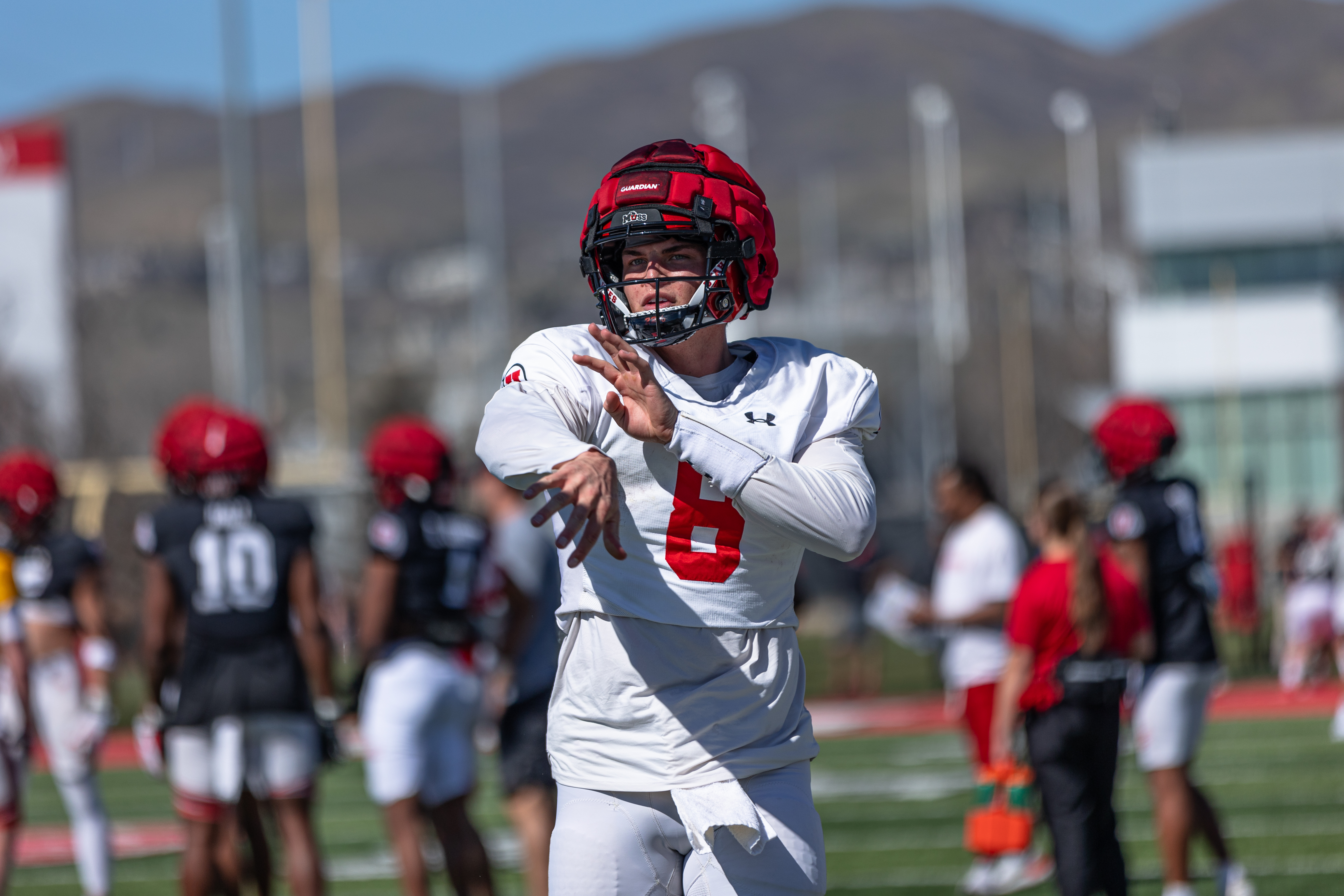 Quarterback Brandon Rose tosses a pass during spring practices in Salt Lake City.