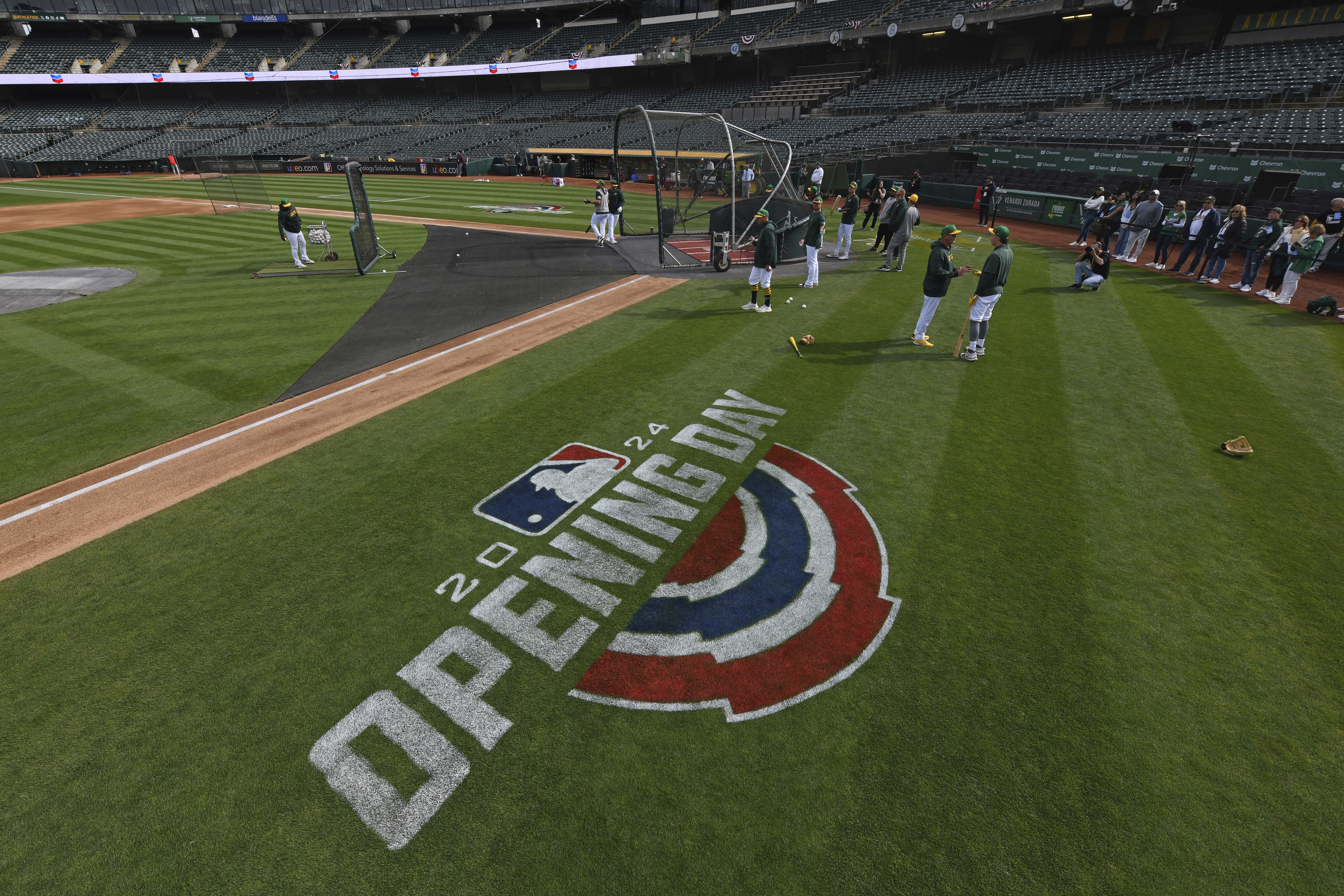 The Oakland Athletics take batting practice before opening day baseball game at the Coliseum in Oakland, Calif., on Thursday, March 28, 2024. 