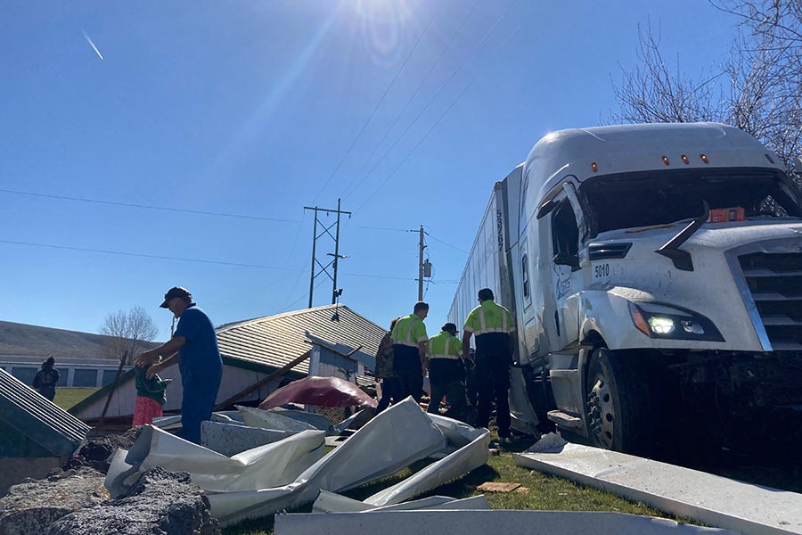 Semitruck crash narrowly misses Idaho home; destroys adjacent garage
