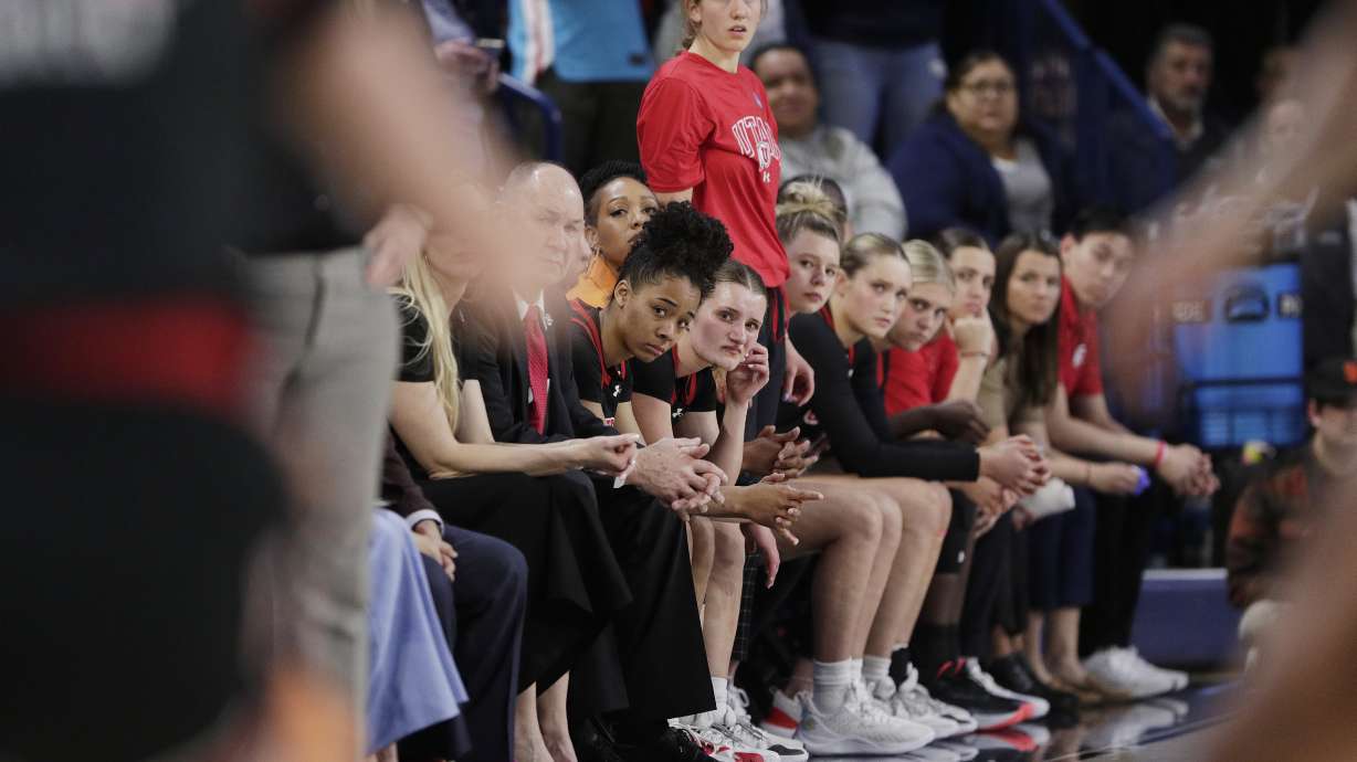 FILE - Players and staff on the Utah bench react toward the end of a second-round college basketball game against Gonzaga in the NCAA Tournament in Spokane, Wash., Monday, March 25, 2024. Police investigating racist incidents directed toward the Utah women's basketball team when they were near their Idaho hotel while in town last month for the NCAA Tournament said in a Wednesday, April 3, post on Facebook, they've found an audio recording, in which the use of a racial slur was clearly audible.