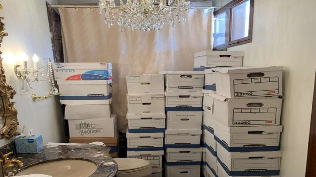 Boxes of records are stored in a bathroom and shower in the Lake Room at Trump's Mar-a-Lago estate in Palm Beach, Fla. A federal judge has refused to throw out the classified documents prosecution against Trump.