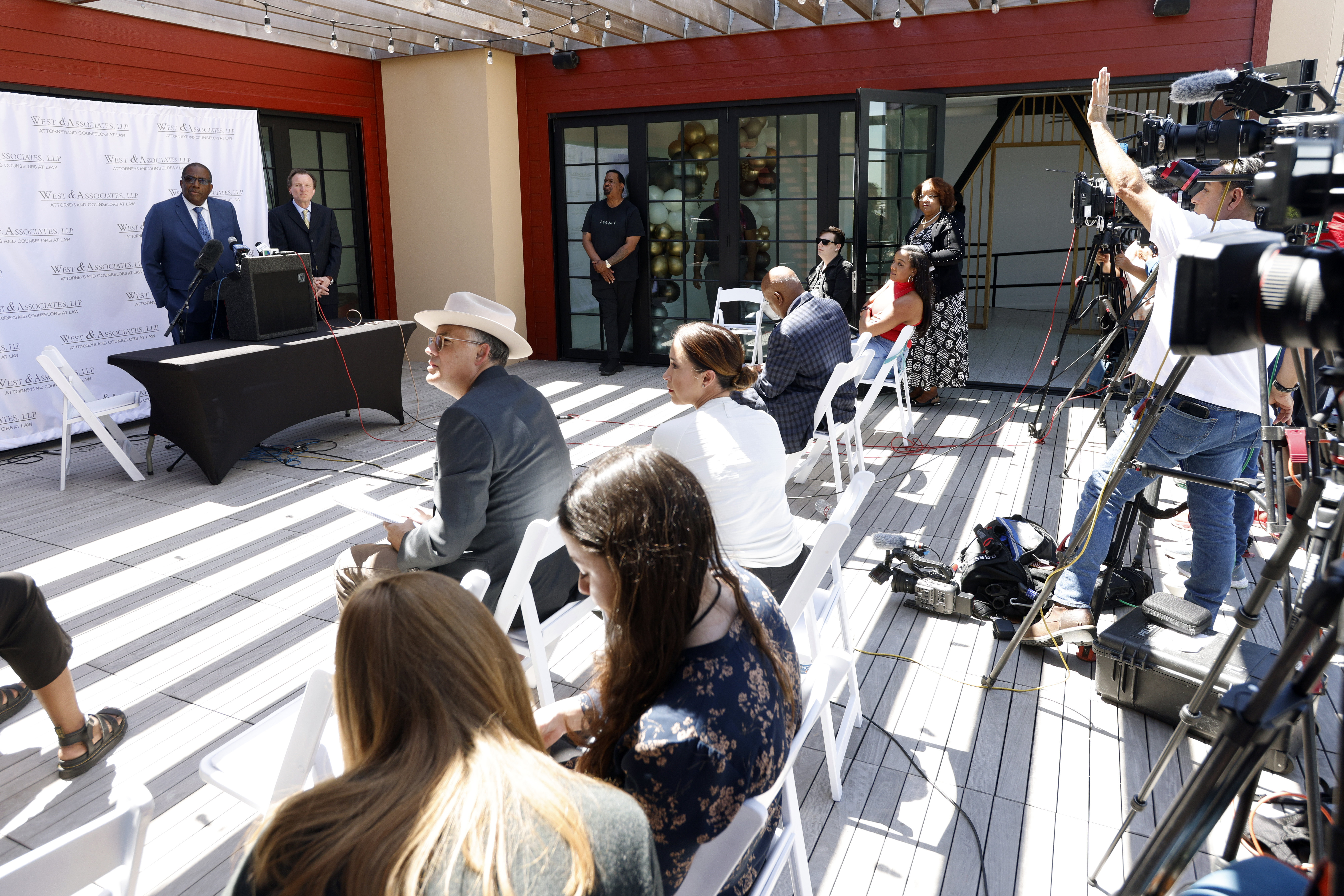 Kansas City Chiefs NFL football player Rashee Rice's attorney state Sen. Royce West, left, and Craig Capua listen to questions during a news conference regarding a crash, Thursday, April 4, 2024, in Dallas. West said Thursday that the wide receiver was one of the drivers of two speeding sports cars that caused a chain-reaction crash on a Dallas highway over the weekend and then fled the scene. 